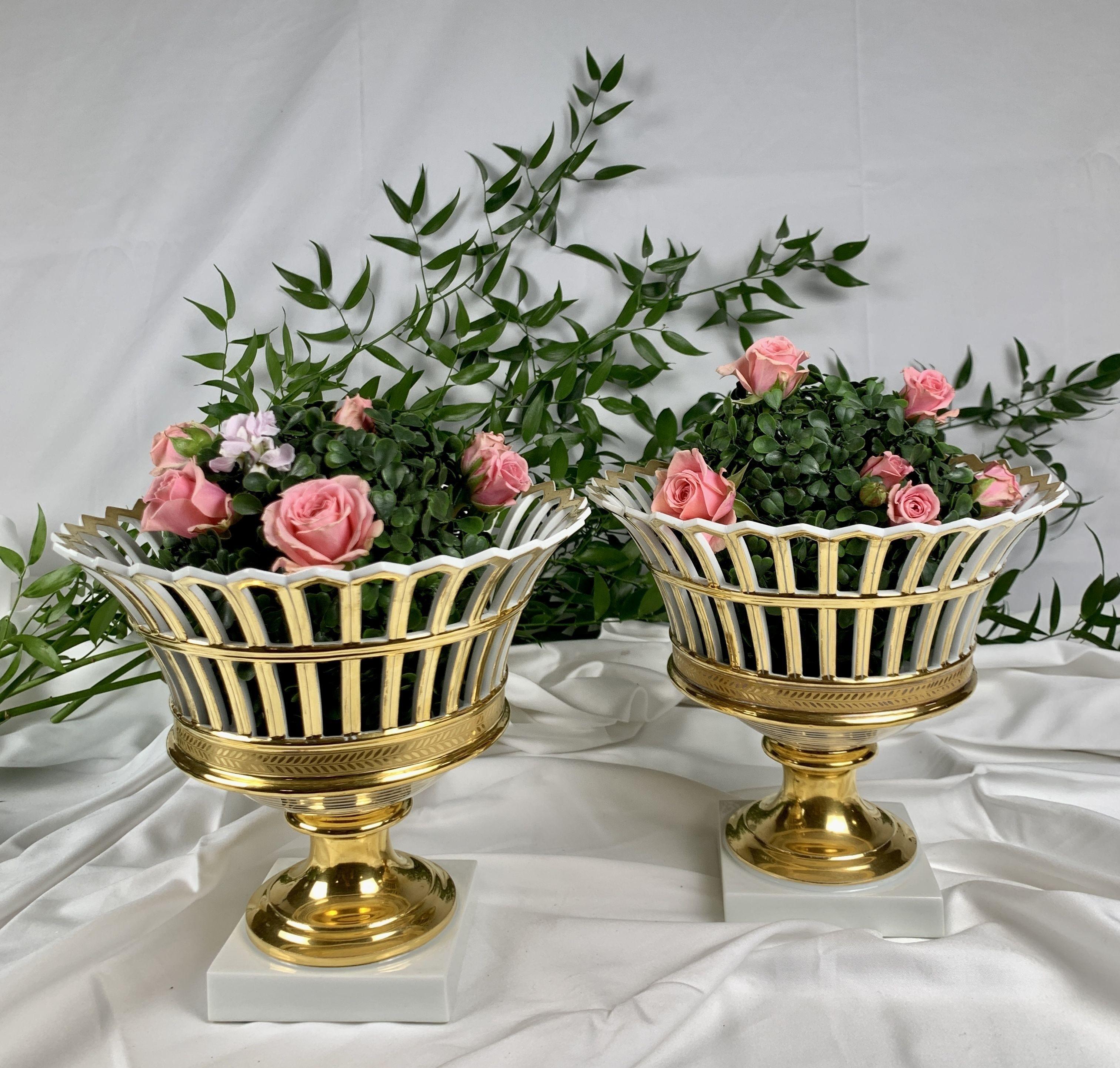 Made in France circa 1860, this beautiful pair of Paris Porcelain baskets are classic French style.
They are elegant and formal with exquisite gilt on crisp white porcelain.
The one decorative touch is a lovely small band of chevrons around the