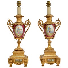 Pair of Antique French Porcelain 
Gilt Metal Table Lamps