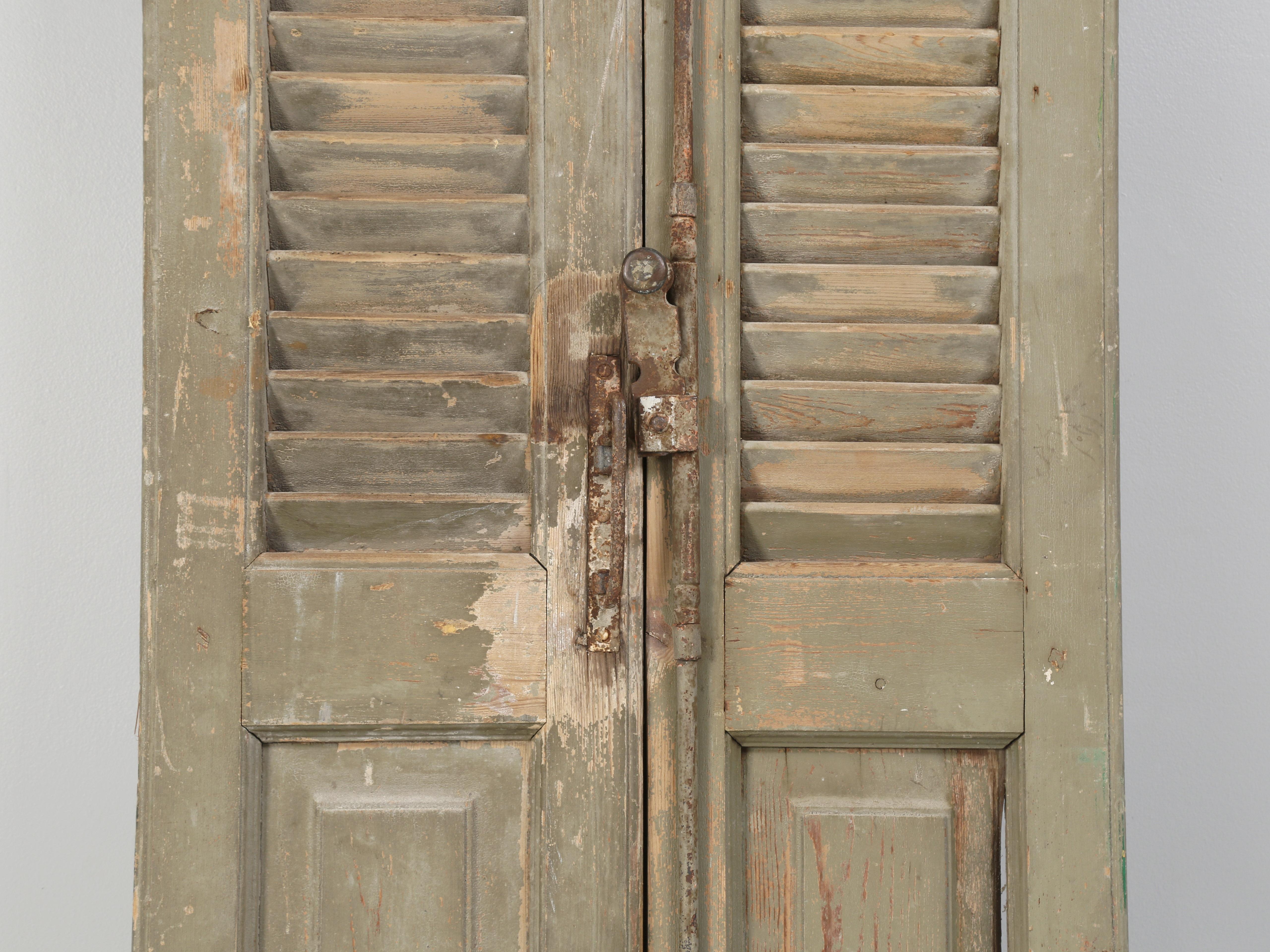 Late 19th Century Pair of Antique French Shutter in Old Crumbly Paint From a Chateau in Brittany For Sale