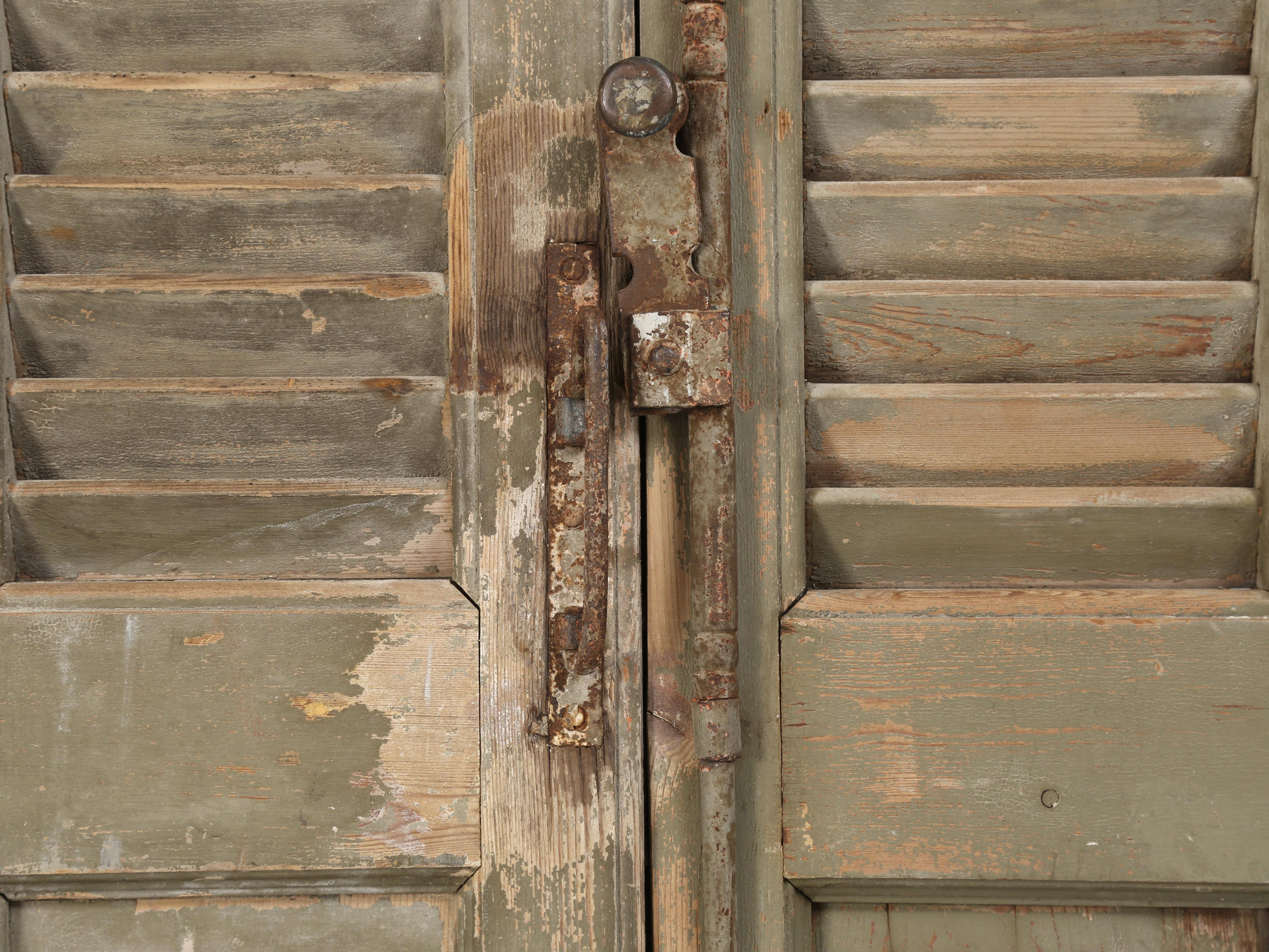 Wood Pair of Antique French Shutter in Old Crumbly Paint From a Chateau in Brittany For Sale