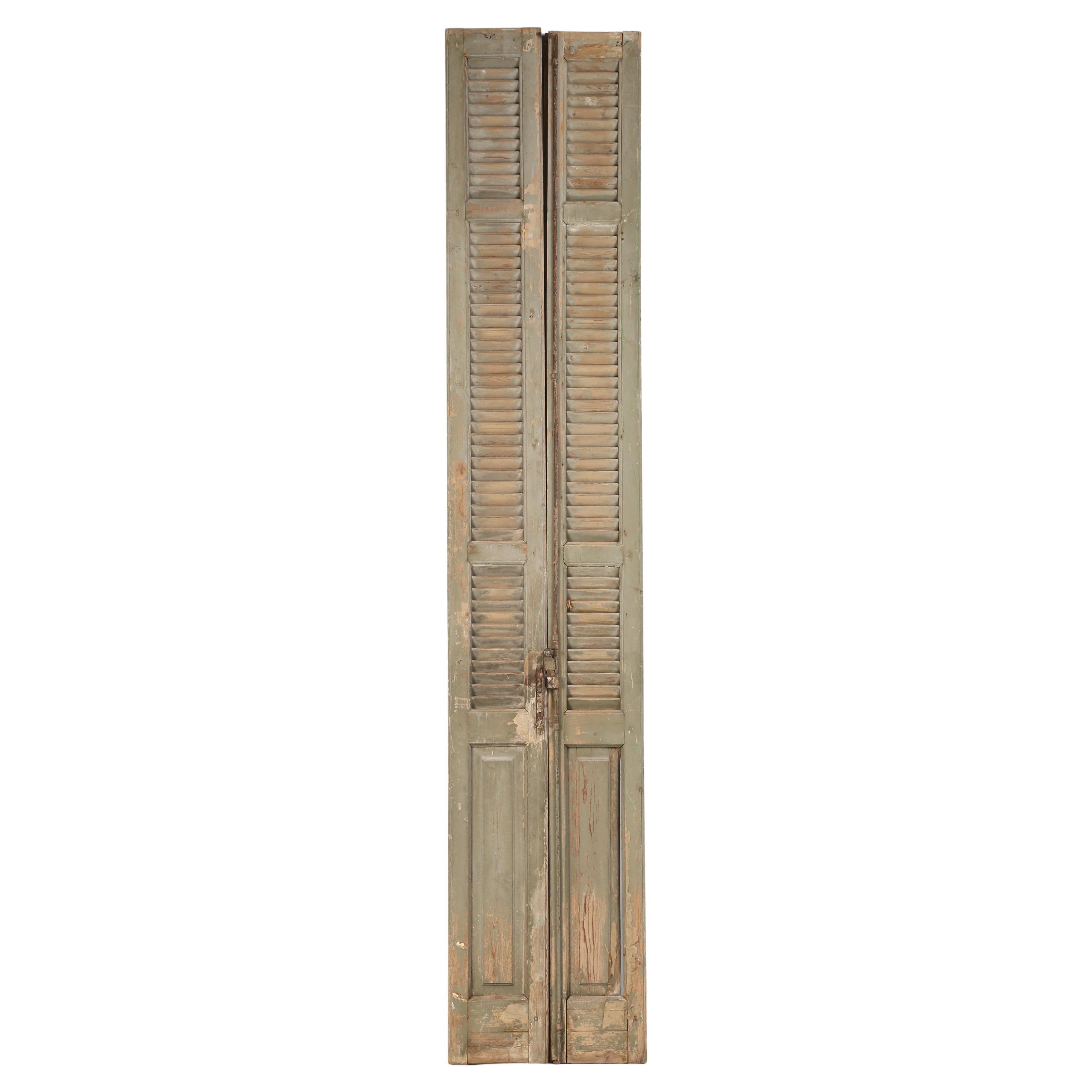 Pair of Antique French Shutter in Old Crumbly Paint From a Chateau in Brittany