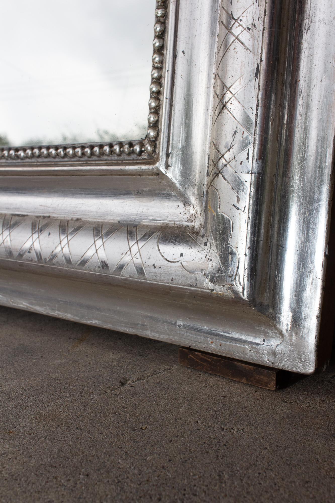 Miroir Paire de miroirs Louis Philippe français anciens en argent doré