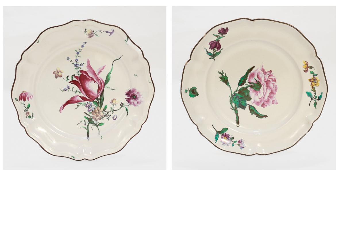 A fine pair of French faience plates.

Attributed to the Hannong / Strasbourg-Haguenau factory in Strasbourg, France.

With a scalloped rim and painted floral decoration to the center.

Marked to the reverse of the plate.

Simply a wonderful set of