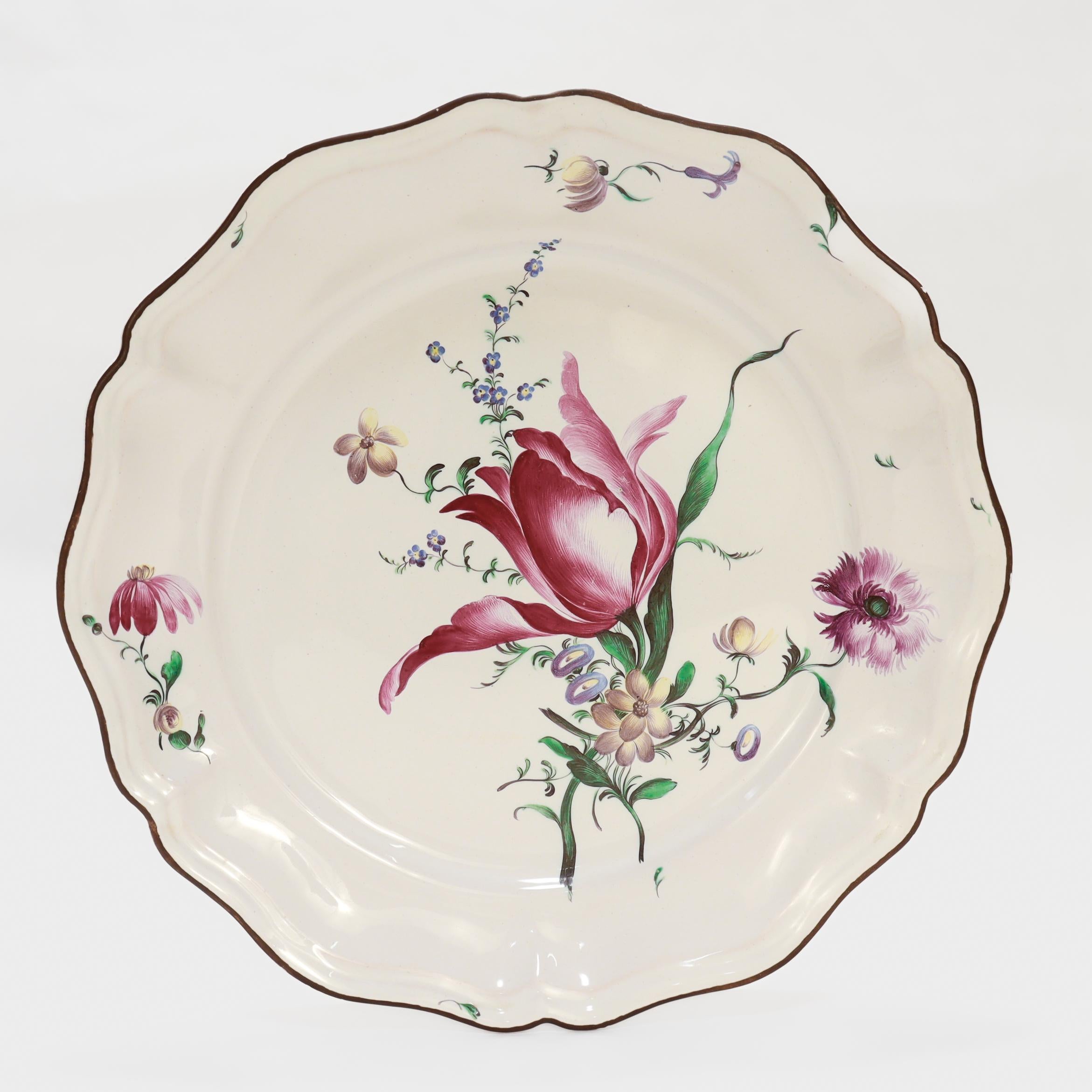 Painted Pair of Antique French Strasbourg Faience Floral Plates For Sale