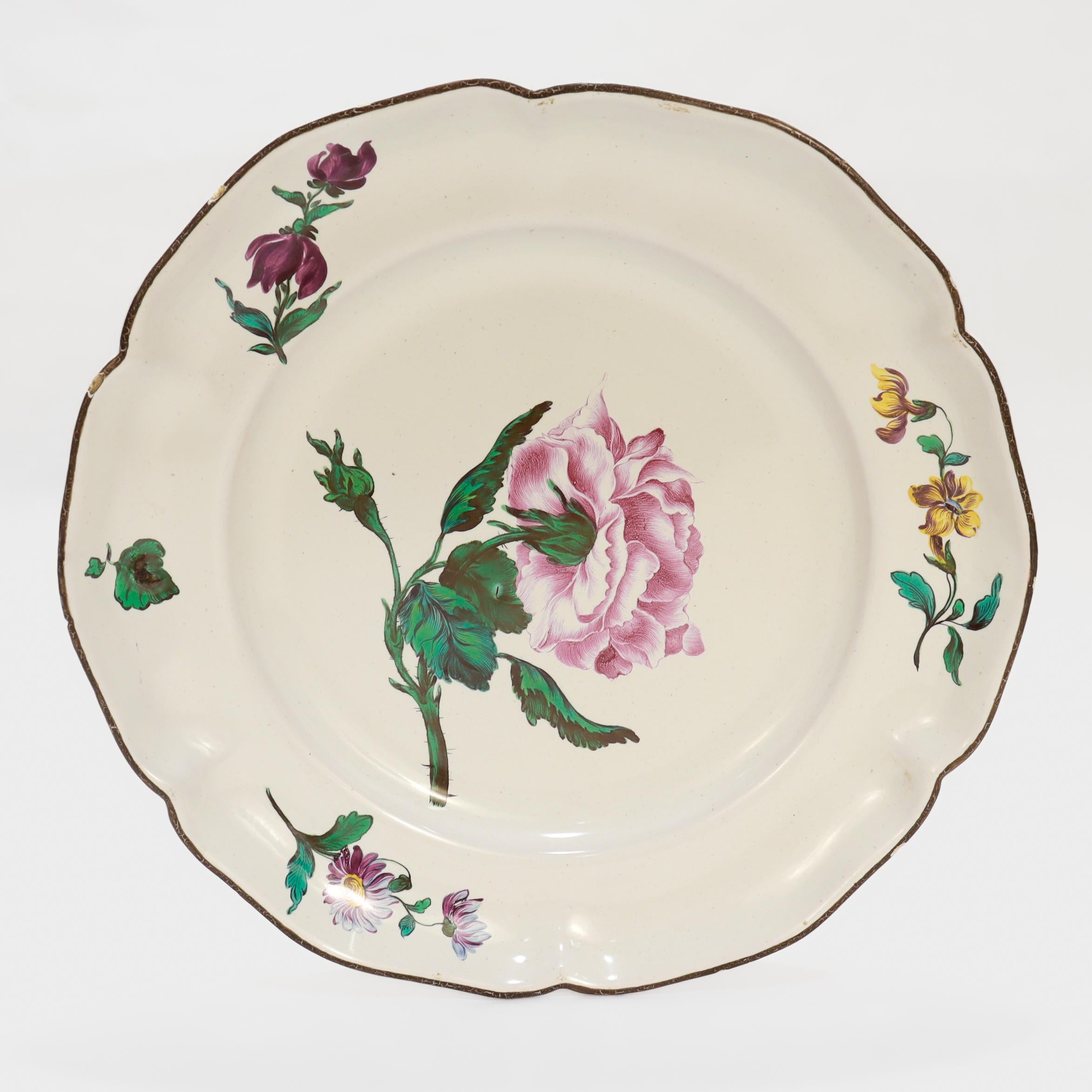 Pair of Antique French Strasbourg Faience Floral Plates In Good Condition For Sale In Philadelphia, PA