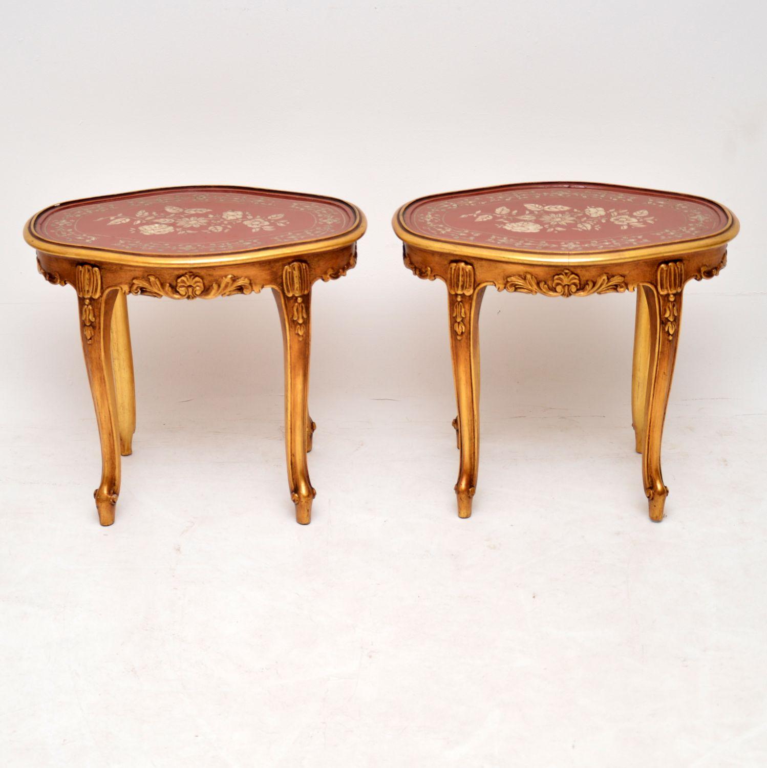 This pair of antique French style giltwood & lacquered side tables do have a matching coffee table to go with them. However, I can’t predict if either item will sell individually. The tops have a red lacquered background with floral decoration. The