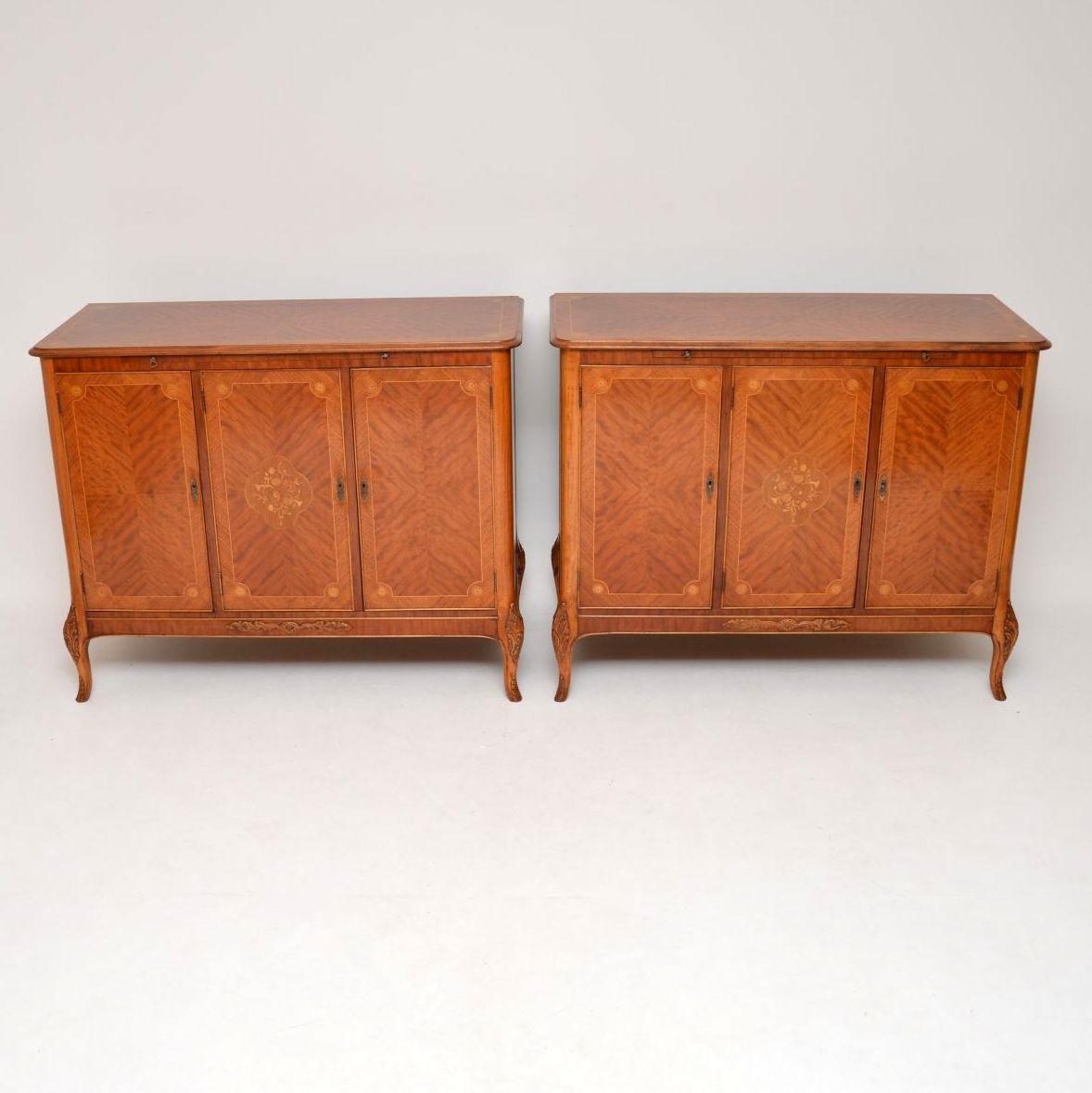 It’s very rare to find a matching pair of antique cabinets of this quality, especially in king wood & with such fabulous interiors. These cabinets are antique French style & in excellent condition, having just been polished & I would date them to