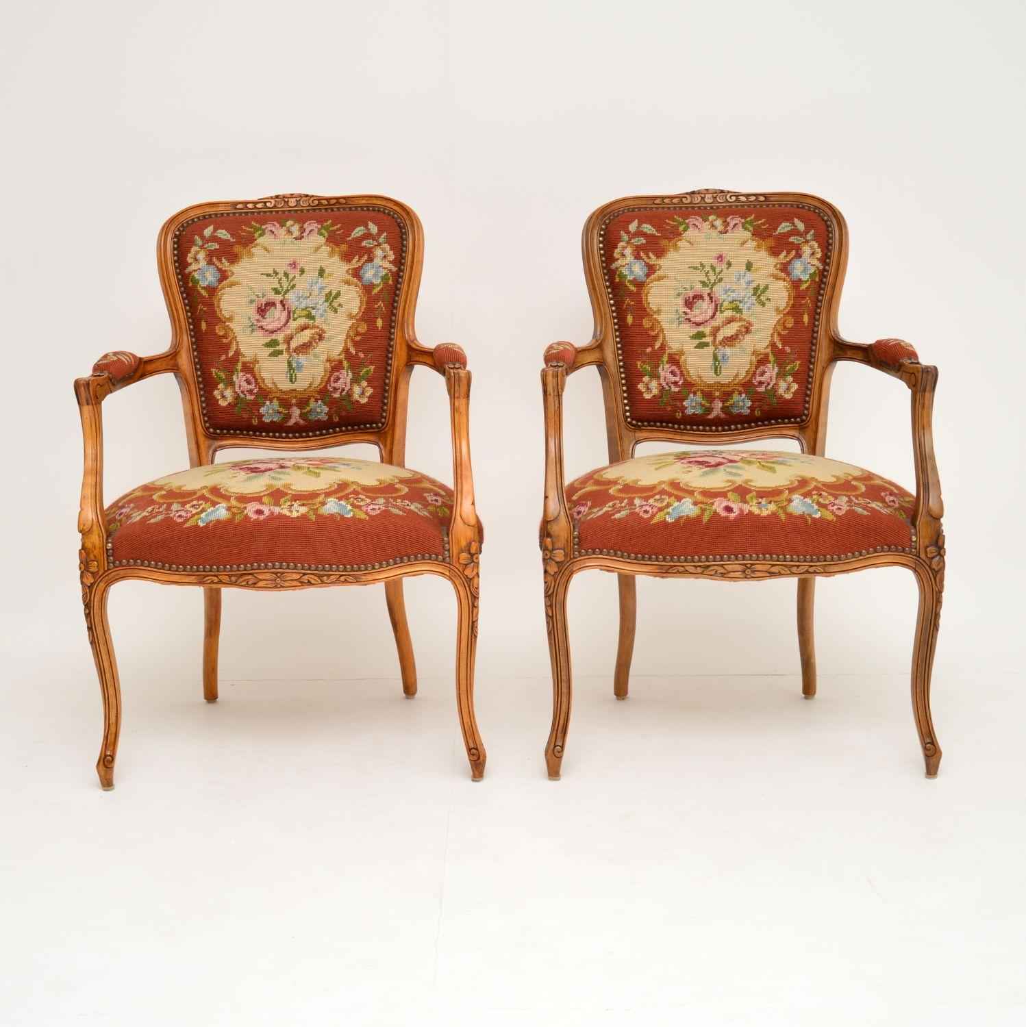 This pair of antique French salon armchairs are in excellent original condition & date from circa 1890-1910 period.

What’s nice, is that they still have the original needlepoint upholstery which is in very good condition. They have sturdy solid
