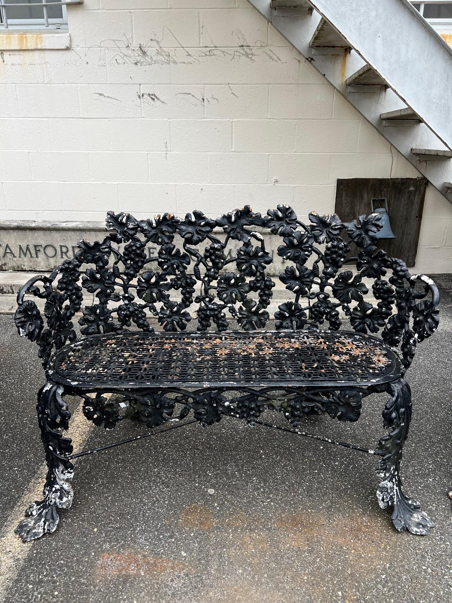Early 20th century pair of Antique French Victorian grapevine leaf cast iron garden benches. Nice pair of antique benches in good condition very sturdy no missing pieces. This pair of benches is from the early 1900s notice the cross bars and screws
