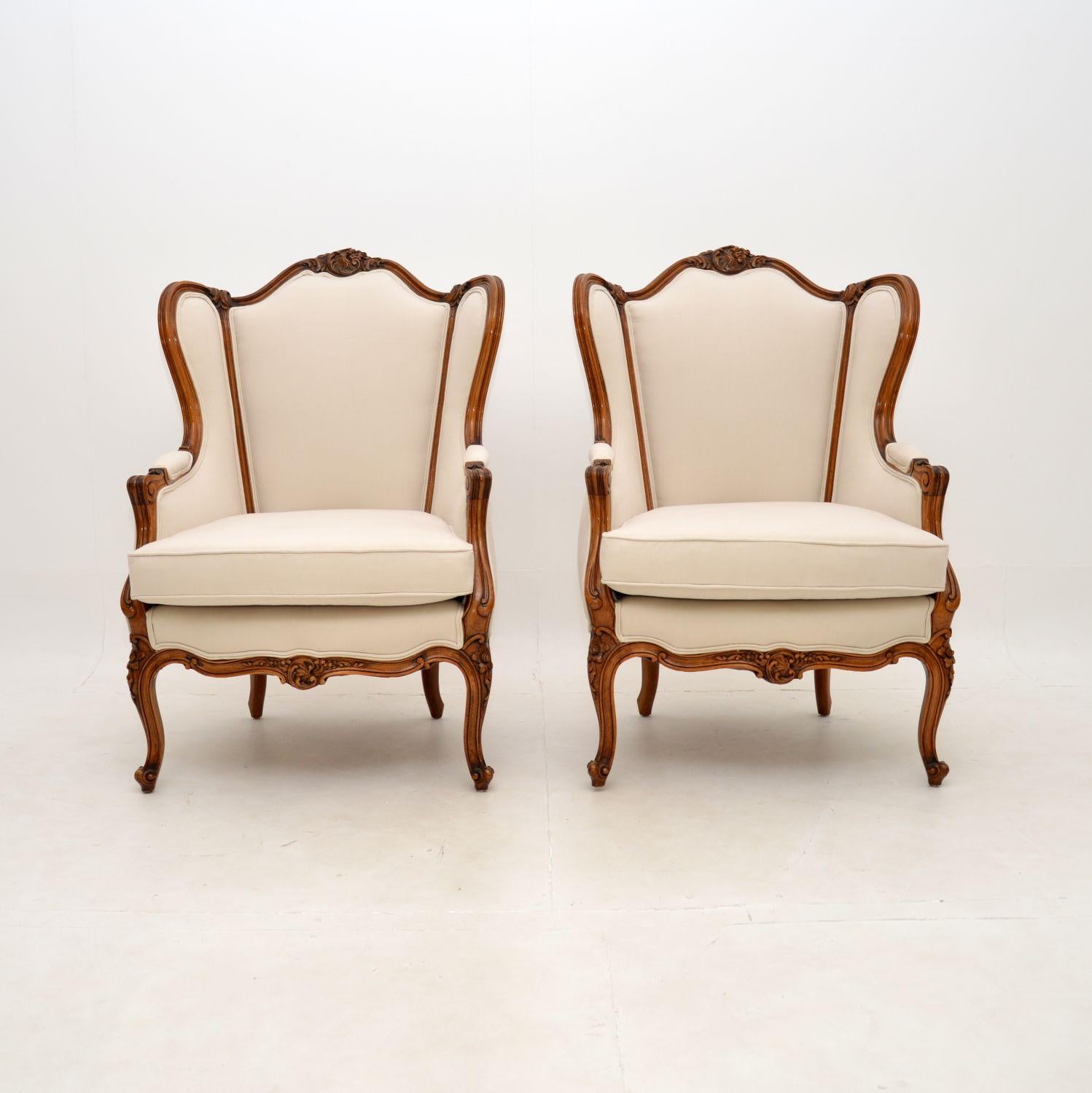 A stunning pair of antique French walnut armchairs. They were made in France and date from around the 1930’s.

The quality is outstanding, the solid walnut frames have beautifully crisp carving and a gorgeous shape. They are nicely designed, very