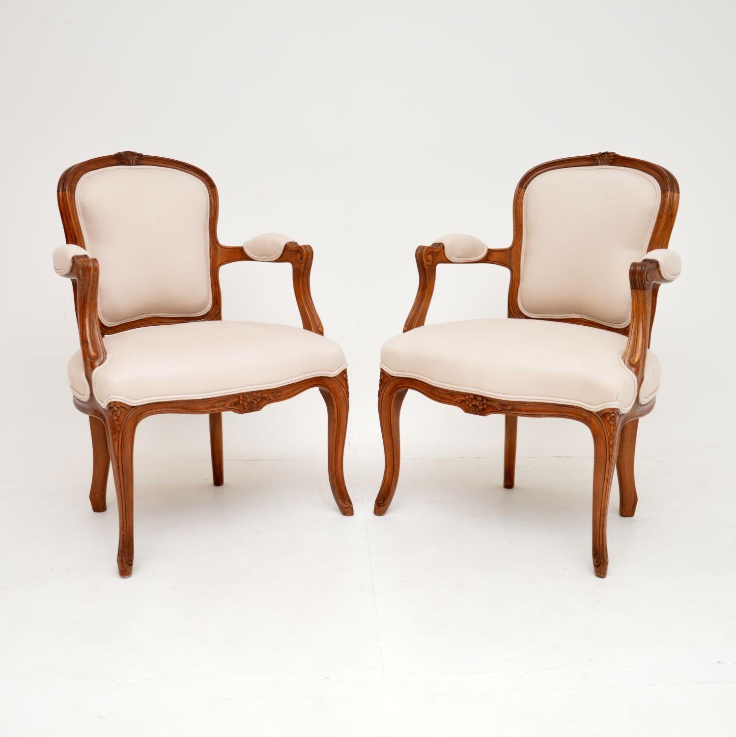 A beautiful pair of antique French salon armchairs in solid walnut. They date from around the 1920-30’s.

The quality is fantastic, the frames are elegant and sturdy, with crisp floral carving. They have lovely proportions and are useful for a