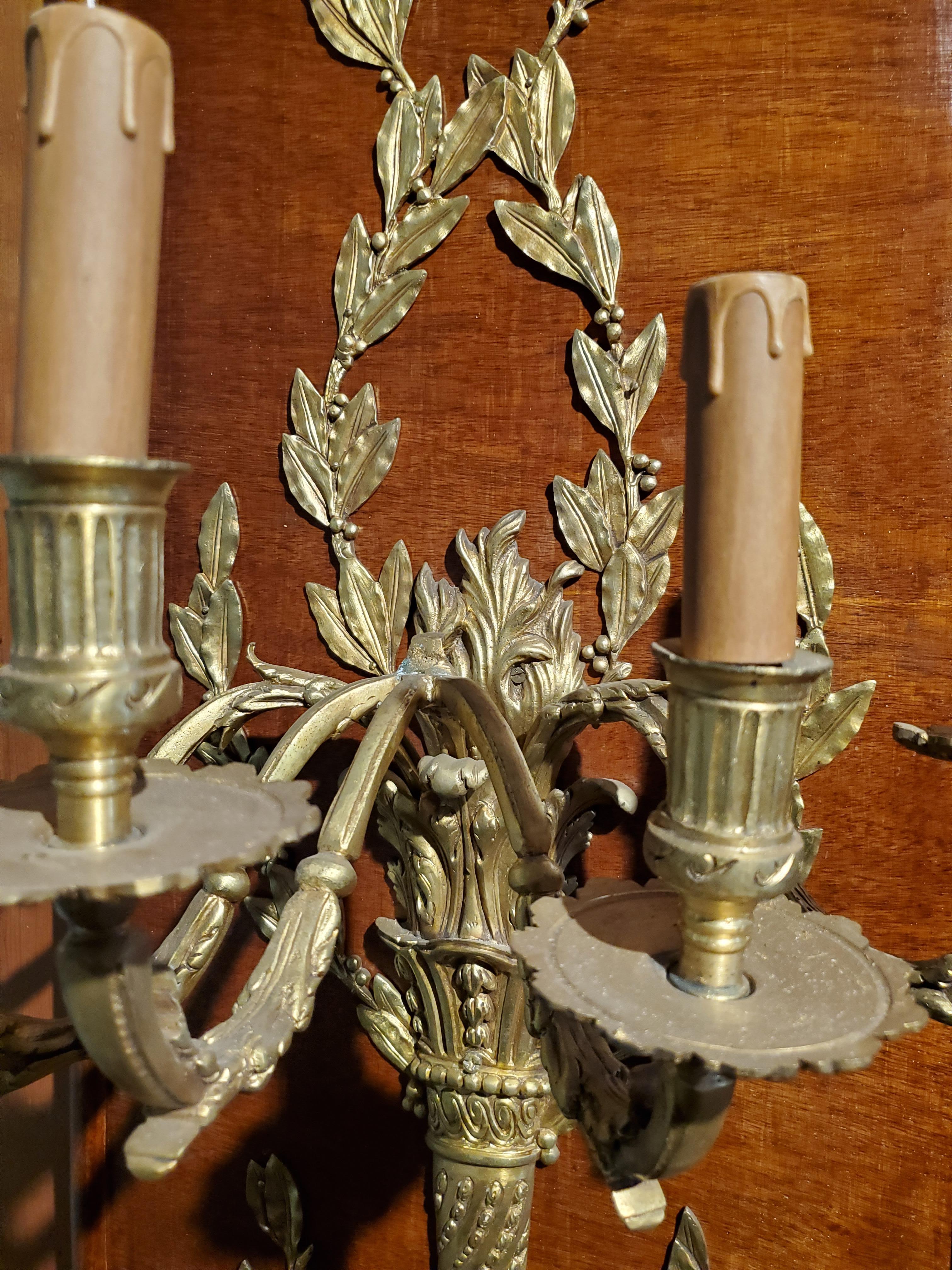 Pair of Antique French Wood Paneled Bronze D'ore Wall Sconces In Good Condition For Sale In New Orleans, LA