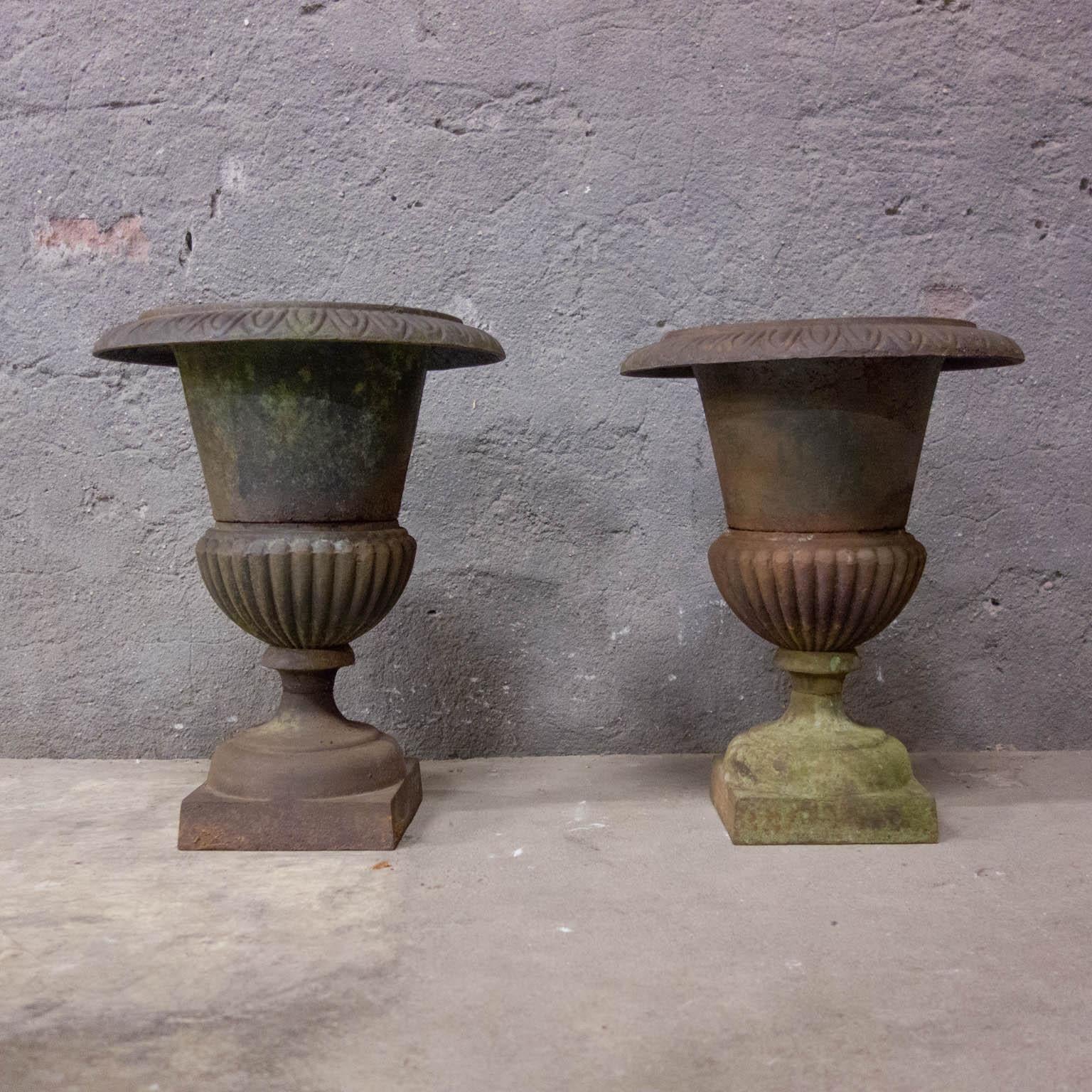 Two beautiful garden vases with a beautiful patina. Both are made of cast iron and suitable for the garden.
Measures: Left– 50cm height / diameter 40cm
Right – 49cm height / diameter 39cm.