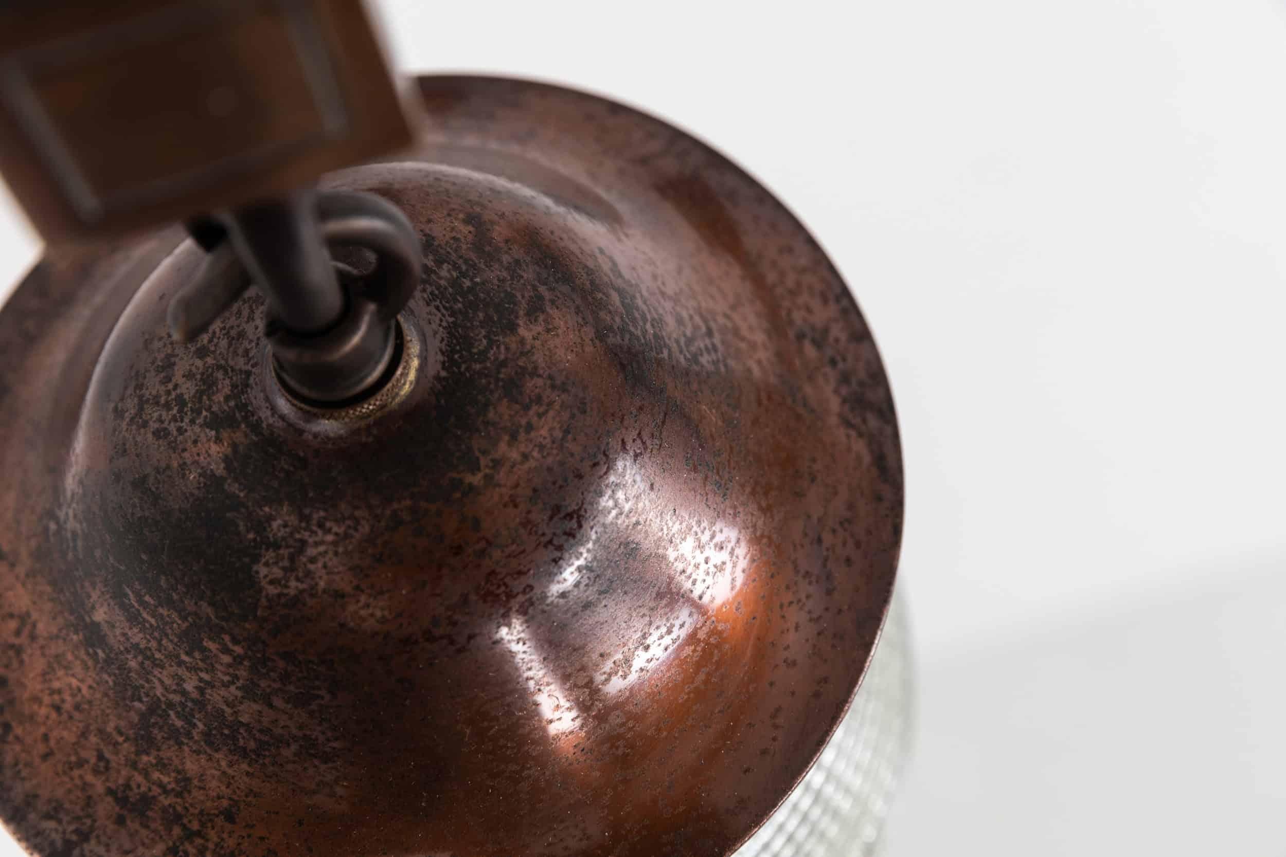 

An incredible pair of brass wall lamps made in England by GEC & Holophane. c.1920

Simply designed cast brass metalware of high quality, complete with original Holophane acorn prismatic glass shades - stamped to tip and galleries. Priced as a