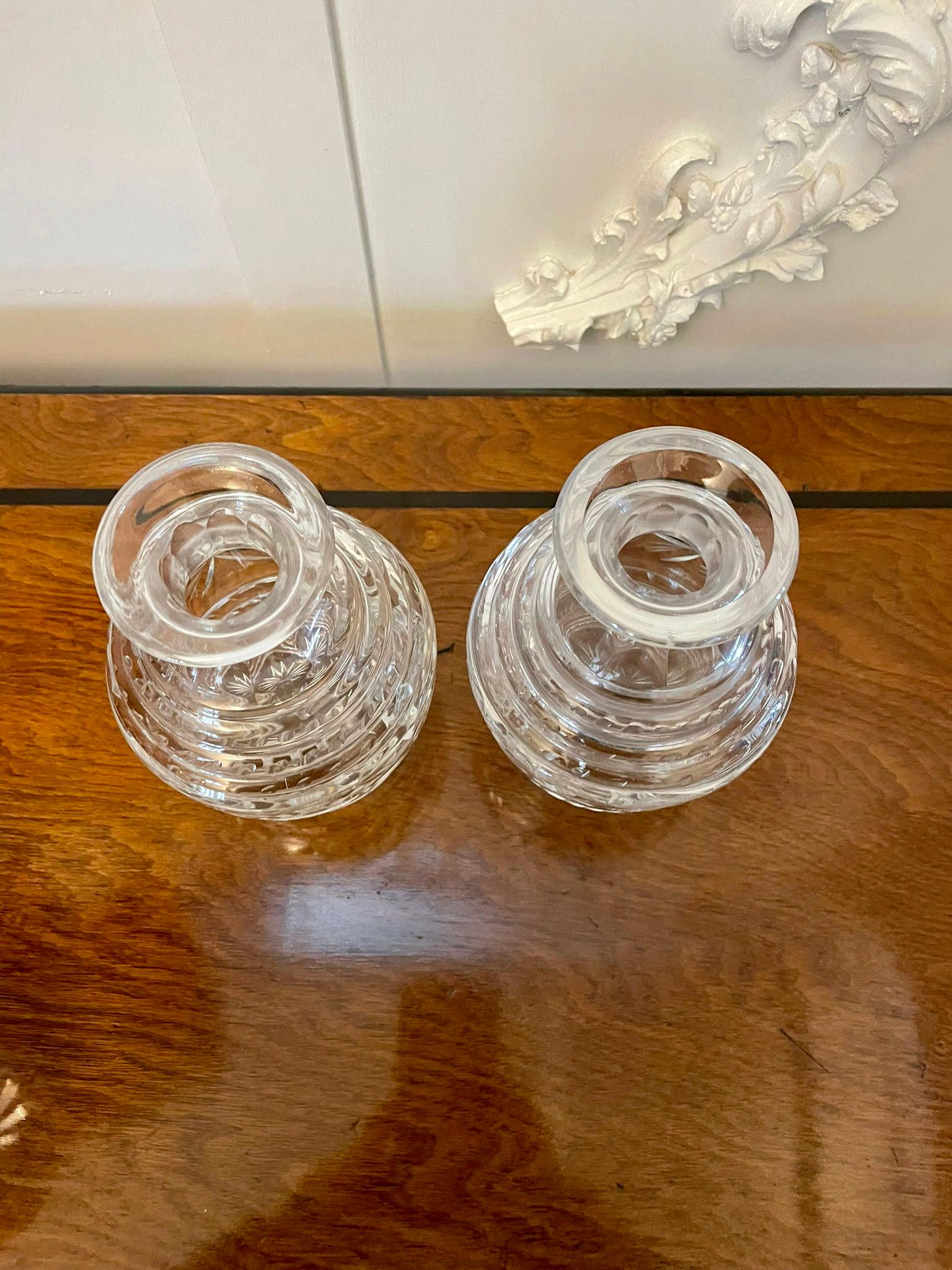 Pair of antique George III quality cut glass decanters having original cut glass mushroom shaped stoppers

In mint original condition

H 19.5 x W 12 x D 12cm
Date 1800.
 