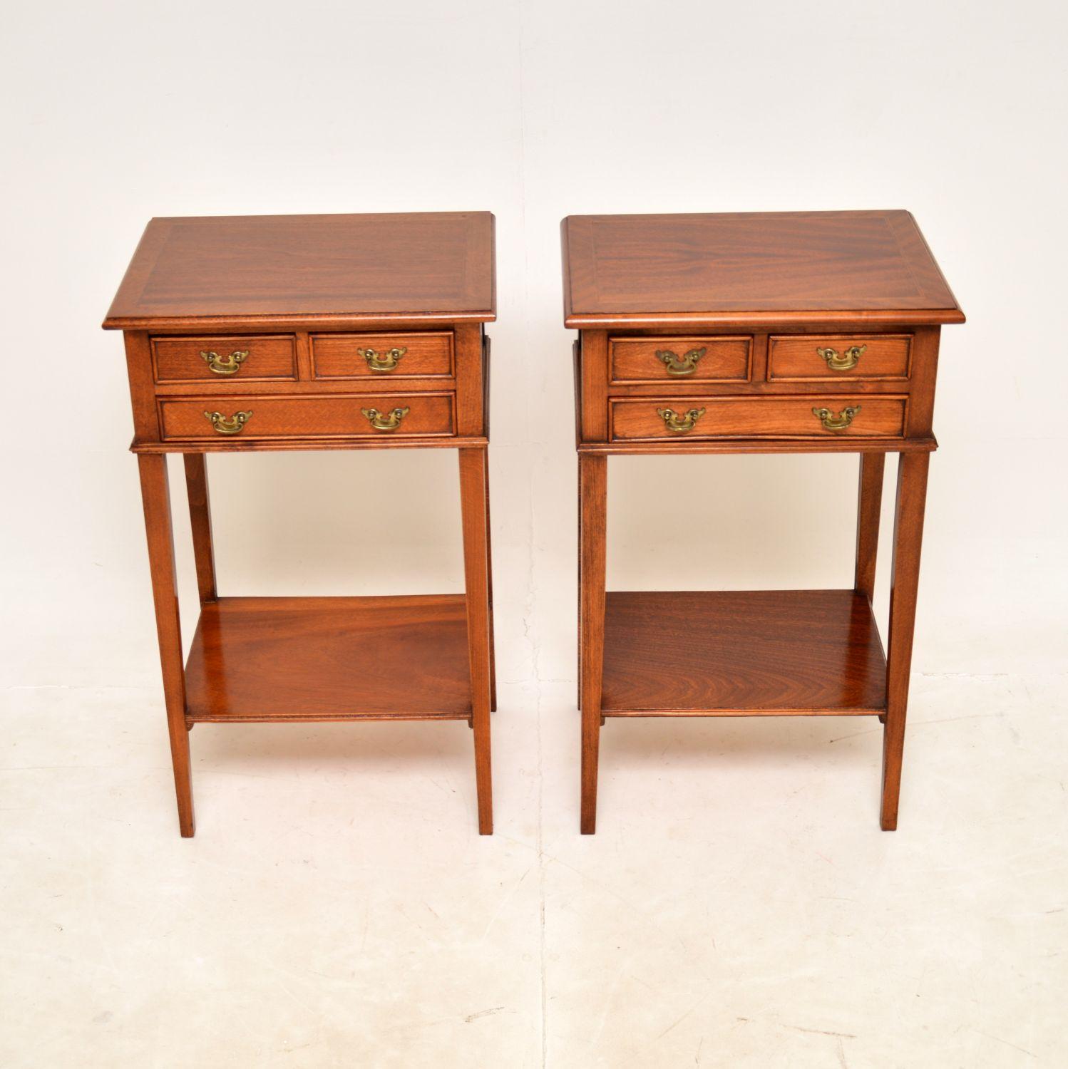 A smart and very well made pair of antique Georgian style side tables. They were made in England, they date from around the 1960’s.

The quality is excellent, they are made from a combination of woods. The tops are cross banded, the drawers have