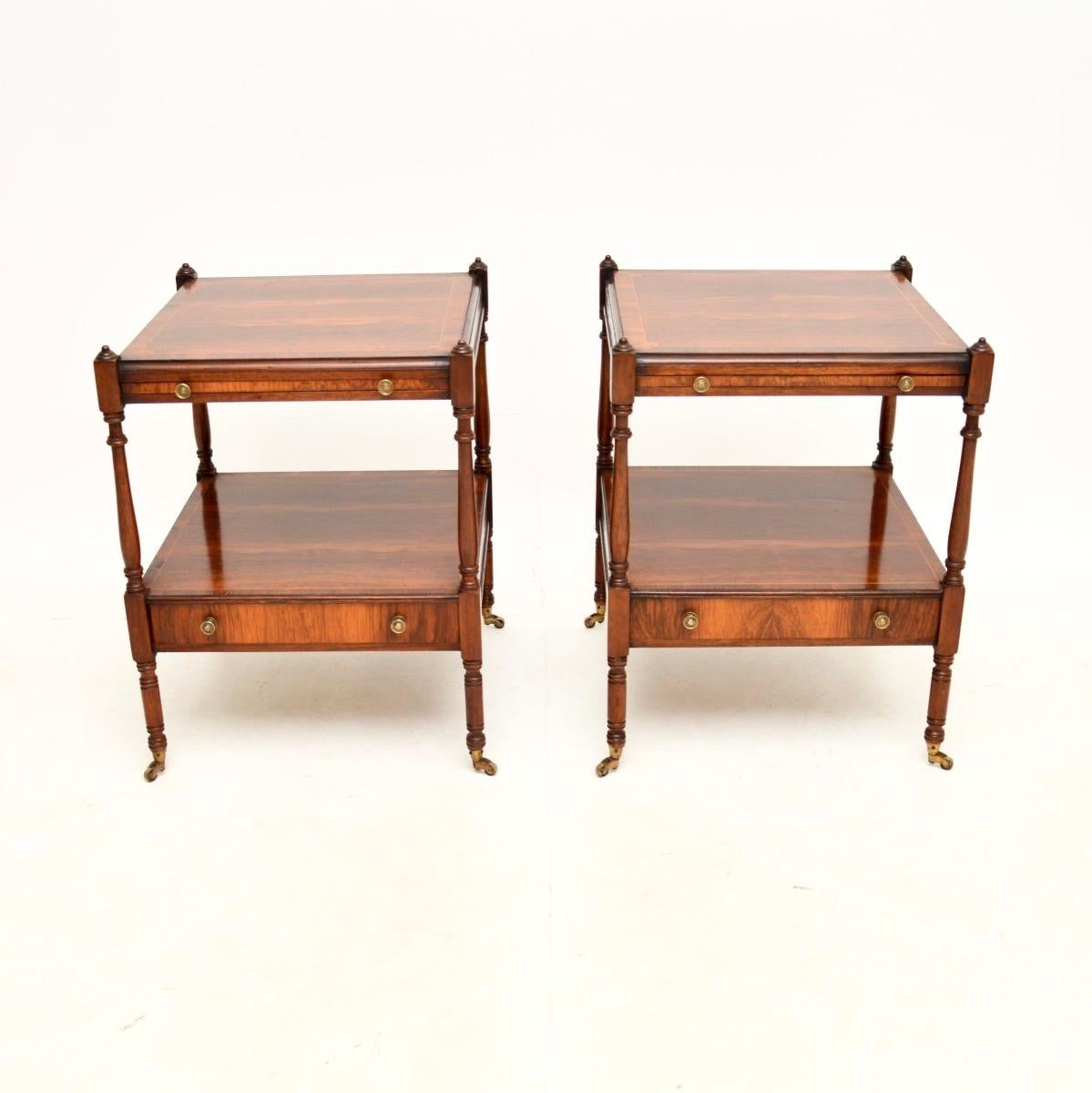 A fantastic pair of antique Georgian style side tables. They were made in England, and date from around the 1930’s.

The quality is great, they are very well made with cross banded tops, beautiful inlays around the borders, nicely turned finials and
