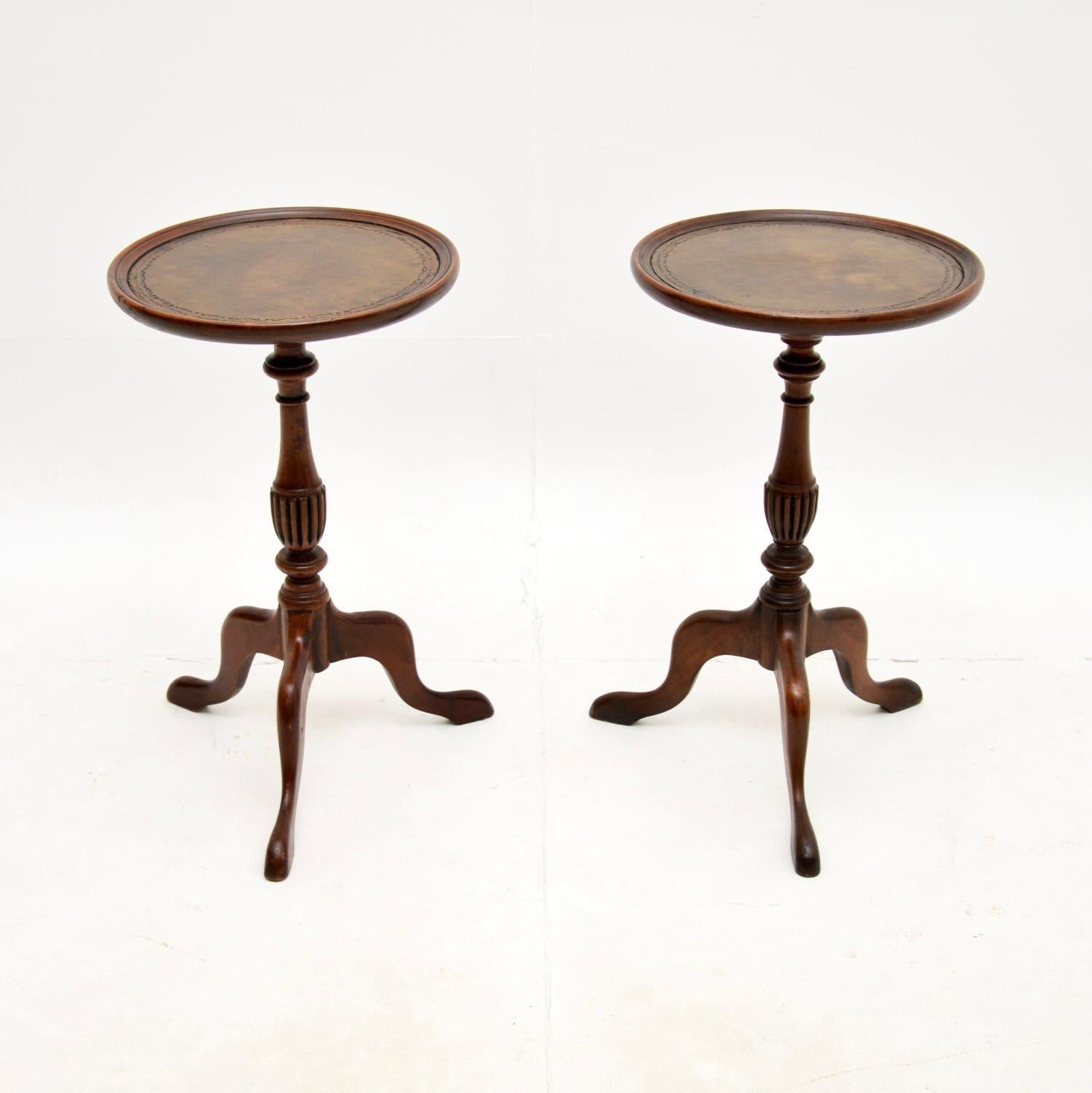 A smart and very useful pair of antique leather top wine tables. They were made in England, they date from around the 1950’s.

They are extremely well made, the quality is superb. The frames are beautifully turned, sitting on tripod bases with inset