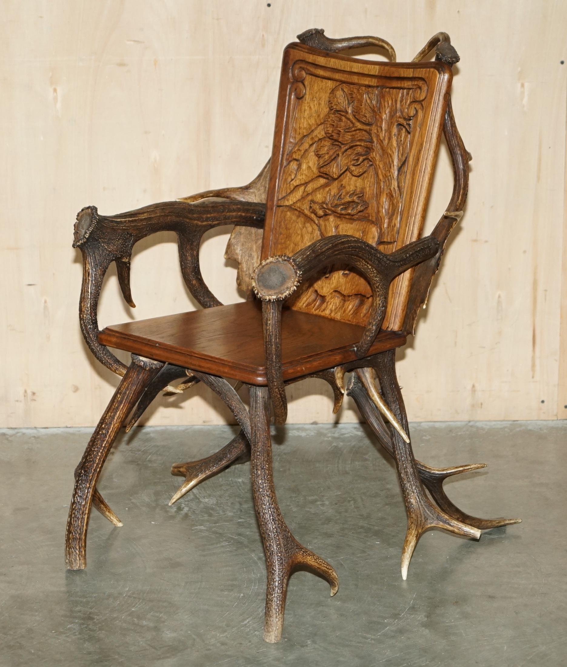 PAIR OF ANTIQUE GERMAN BLACK FOREST CARVED ANTLER ARMCHAiRS PART OF A SUITE For Sale 9