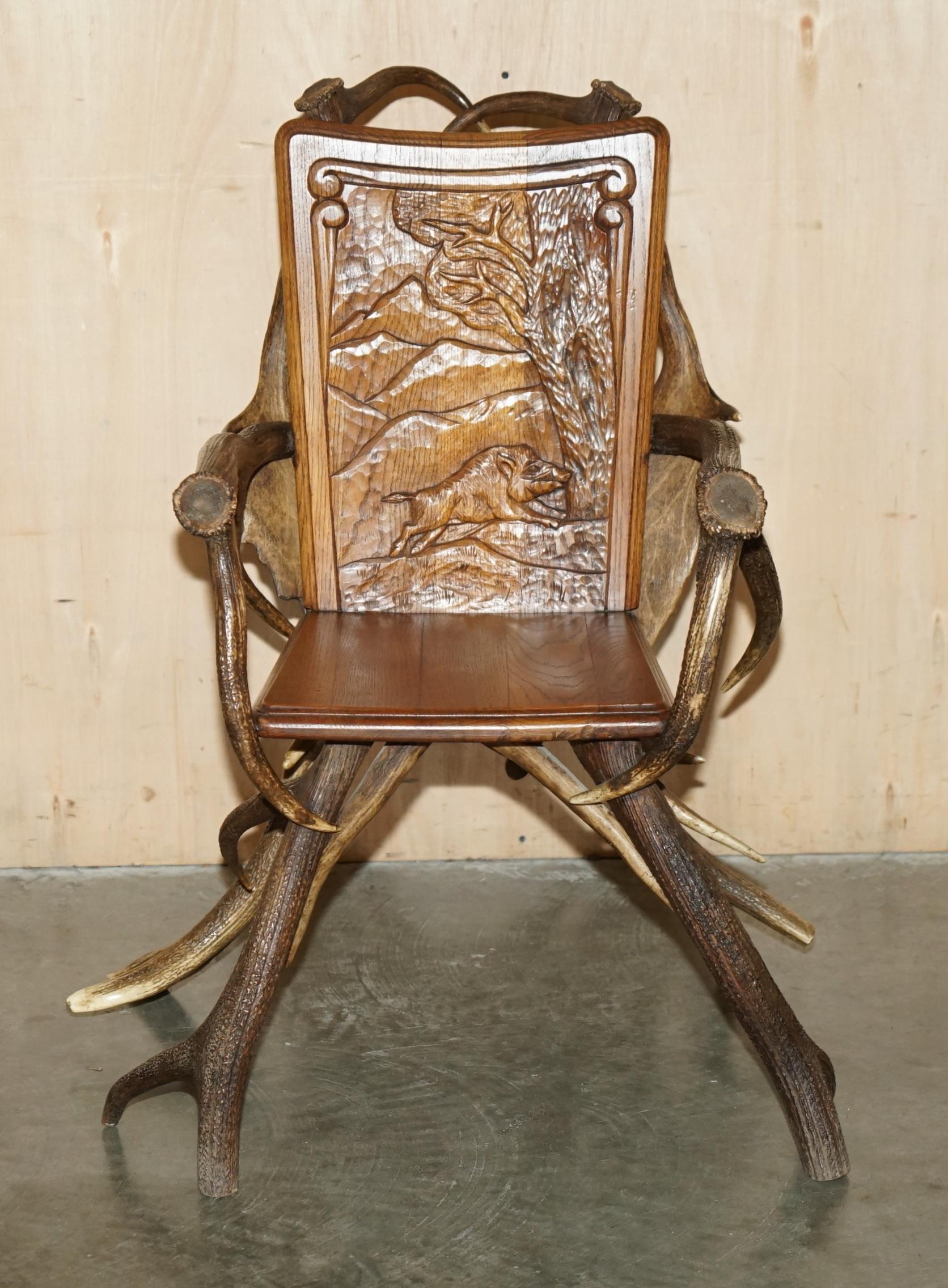 European PAIR OF ANTIQUE GERMAN BLACK FOREST CARVED ANTLER ARMCHAiRS PART OF A SUITE For Sale