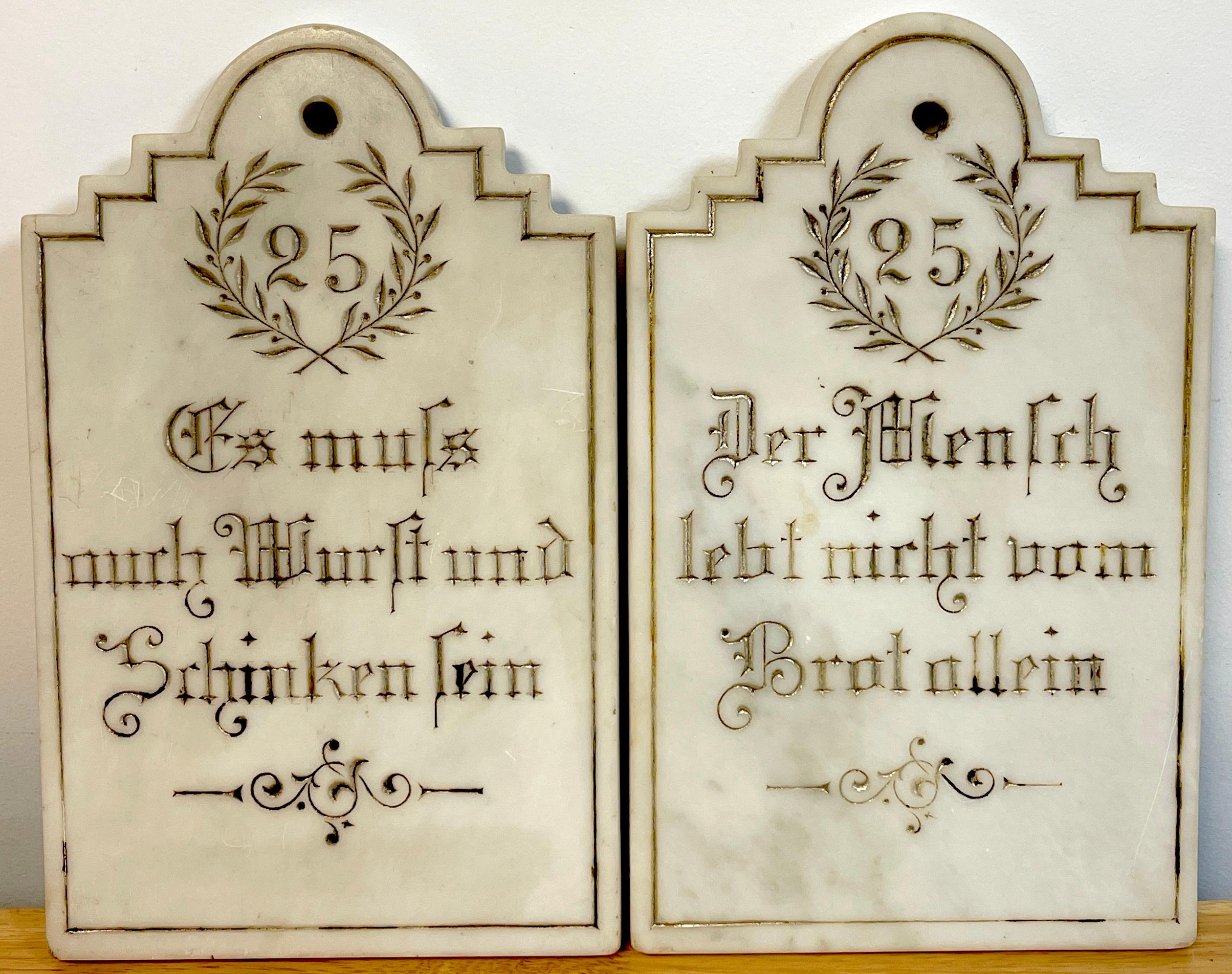 Pair of Antique German Engraved Marble Whimsical Butchers Shop Cutting Boards
Custom made for a 25th Anniversary of a Butcher's shop
circa 1900s

Each one in the Neoclassical style, carved white marble in the shape of a cutting board, Engraved
