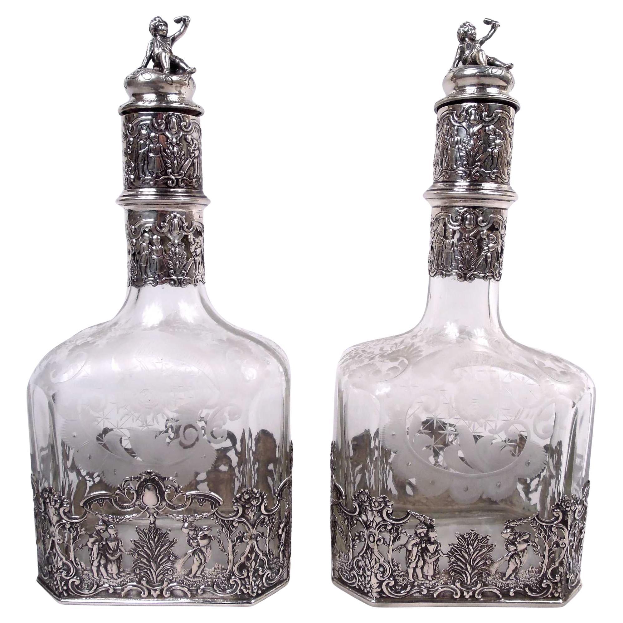Pair of Antique German Hanau Rococo Silver & Glass Decanters