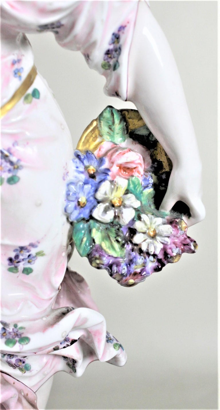 Pair of Antique German or Austrian Porcelain Female Figurines