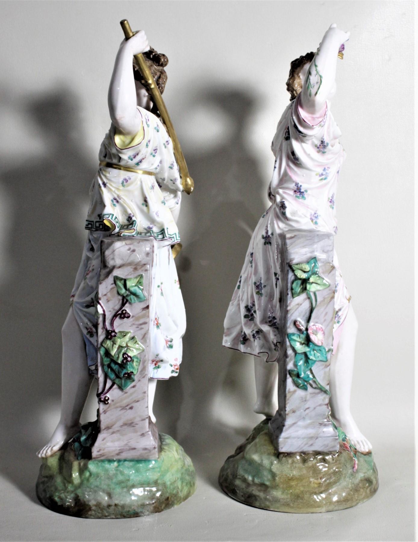 Hand-Painted Pair of Antique German or Austrian Porcelain Female Figurines Harvesting Grapes For Sale
