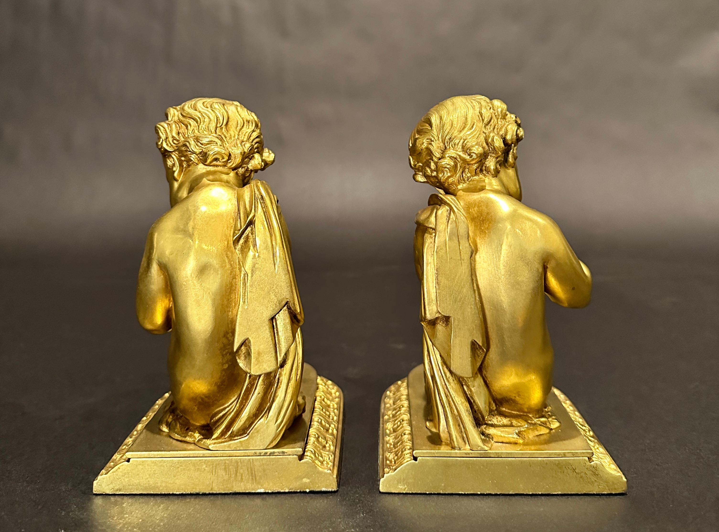20th Century Pair Of Antique Gilt Bronze Bookends Children With Musical Instruments For Sale