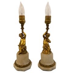 Pair of Antique Gilt Bronze Cherub Lamps