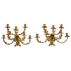 Paire de candélabres muraux anciens en bronze doré