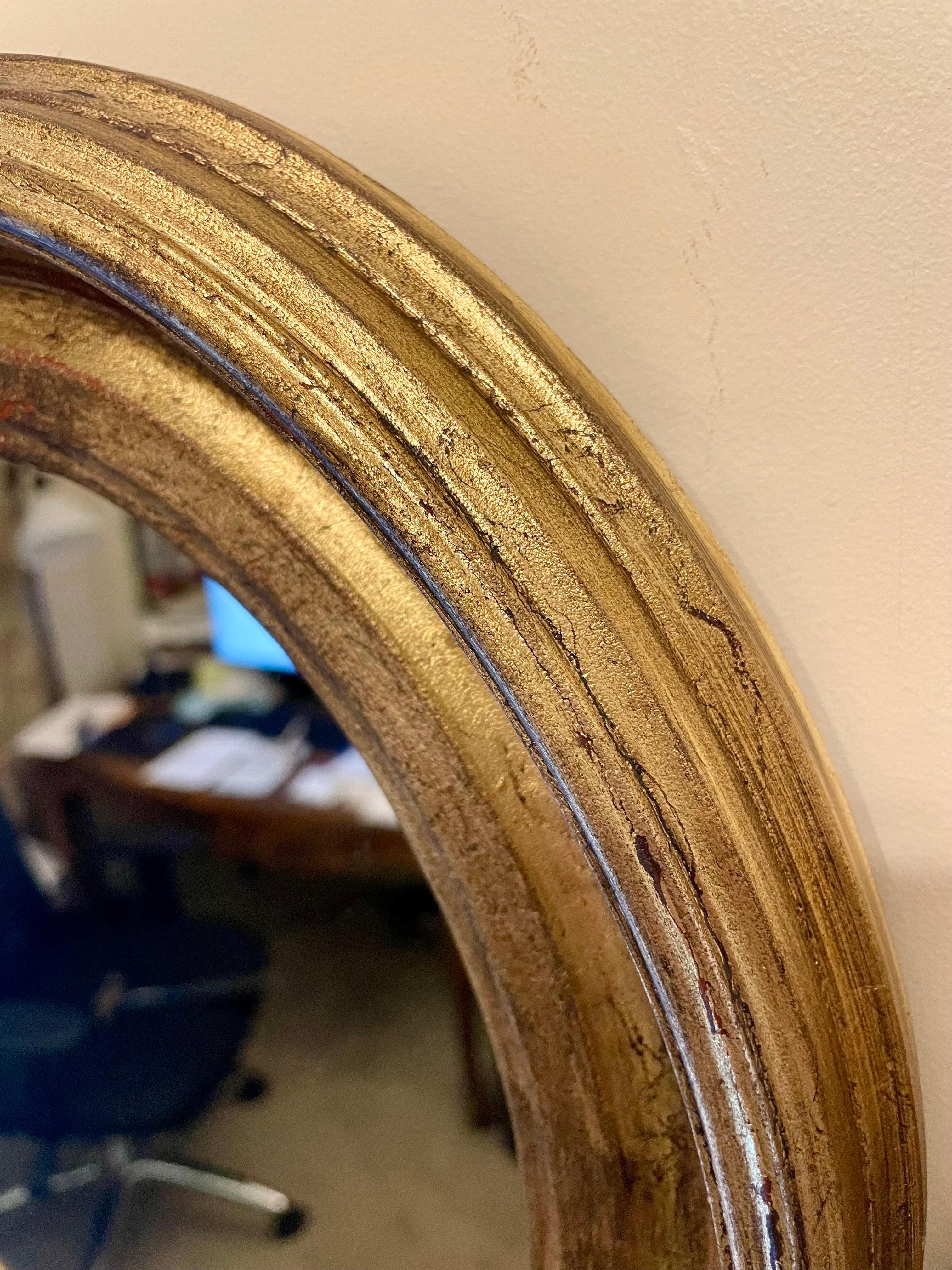 Pair of Antique Gilt Oval Italian Mirrors 1