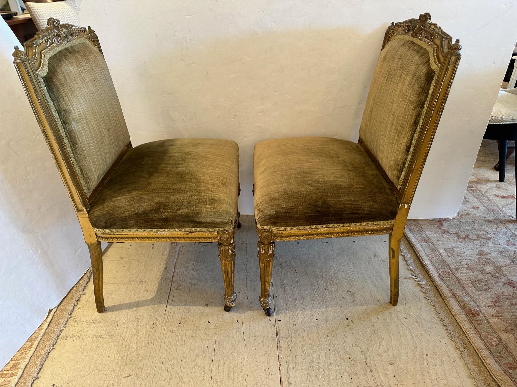 Lovely pair of petite French side chairs having beautifully aged giltwood frames and sumptuous grey velvet upholstery.
Casters on tapered legs. (one wheel missing)
Came for the contents of a Washington DC Embassy