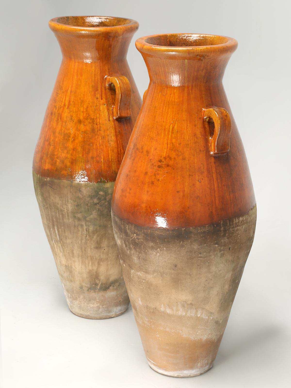 Huge olive oil jar, but are technically called an amphora (Greek: amphoreus), which is a type of container, with two vertical handles in a specific shape and size, designed to carry wine and olive oil. Amphora is derived from the Greek word