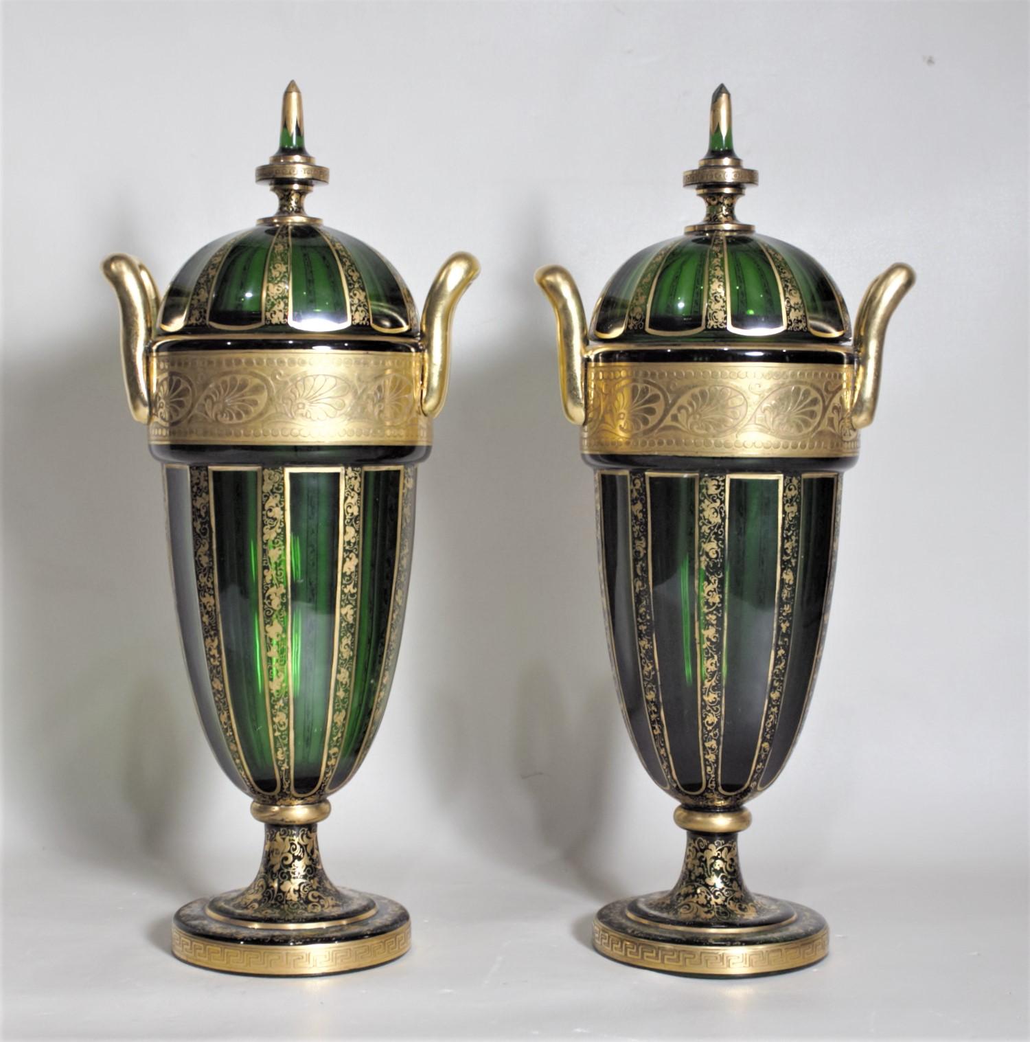 Czech Pair of Antique Green Bohemian Covered Glass Urns with Heavy Gilt Decoration For Sale