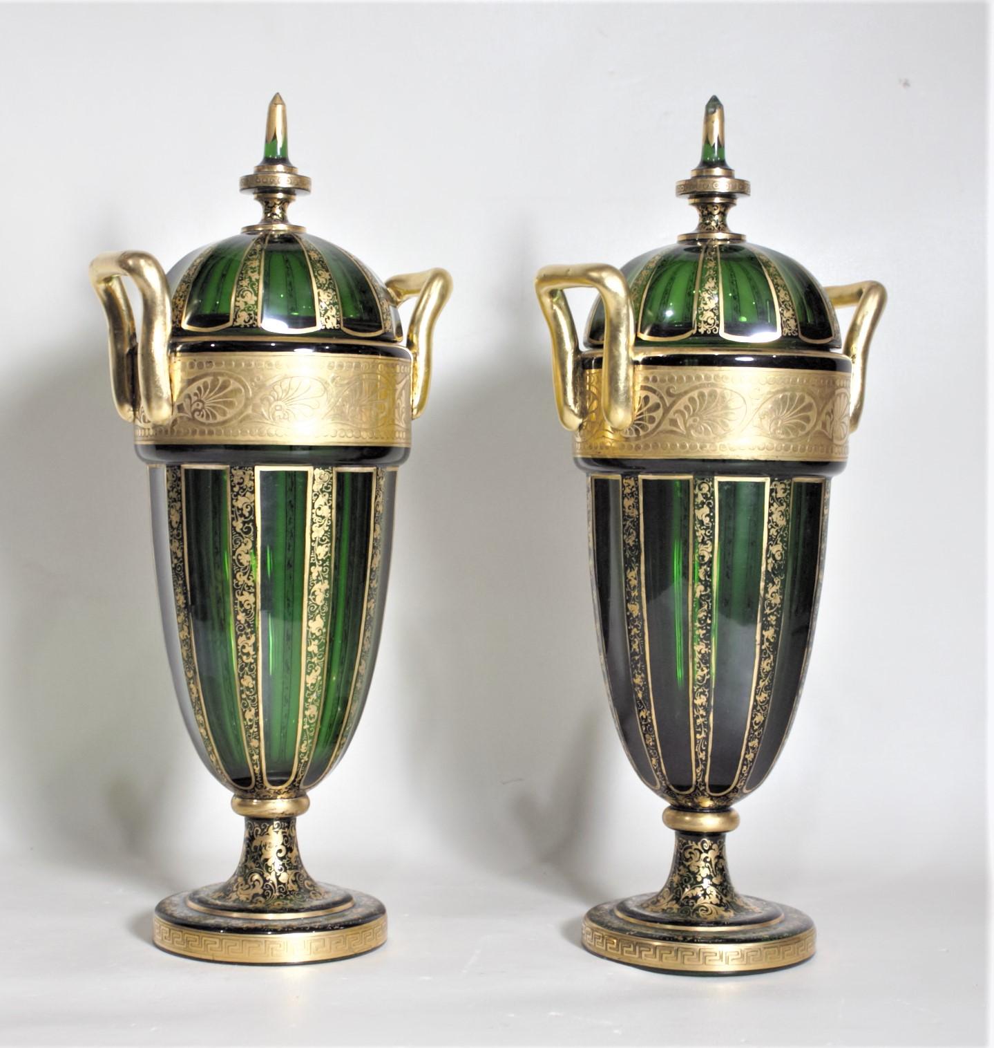 19th Century Pair of Antique Green Bohemian Covered Glass Urns with Heavy Gilt Decoration For Sale