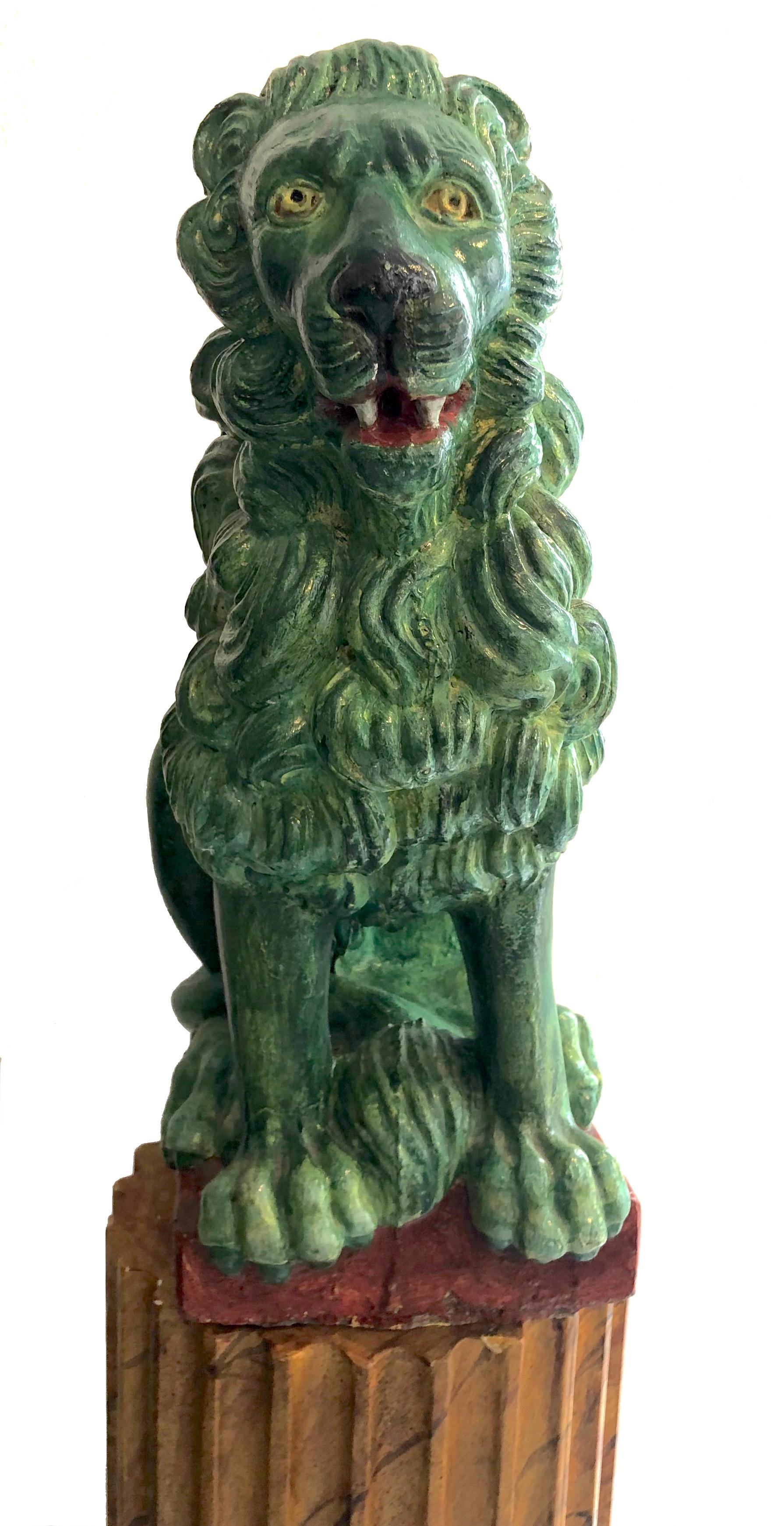 This wonderful pair of green stone cast lions has been crafted in China around 1900.
The stone cast makes them suitable for out-and indoors.  

Measurements lions:          

height 63 cm                     
depth  37 cm                     
width 