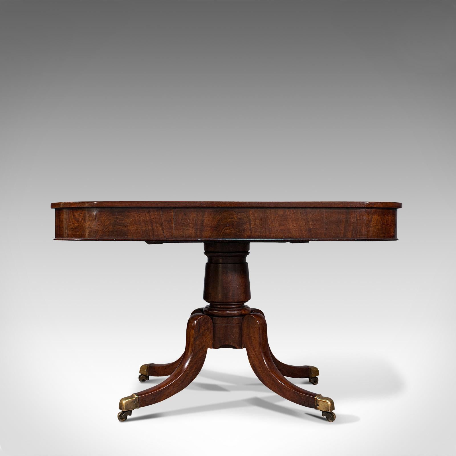 This is a pair of antique hall tables. An English, mahogany side or large lamp table, dating to the Regency period, circa 1830.

Graced with fine colour and attractive craftsmanship
Displaying a desirable aged patina and in good order
Select