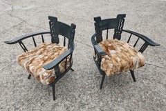 Pair of Antique hand-carved armchairs in black lacquer and fox fur, Italy 1920s
