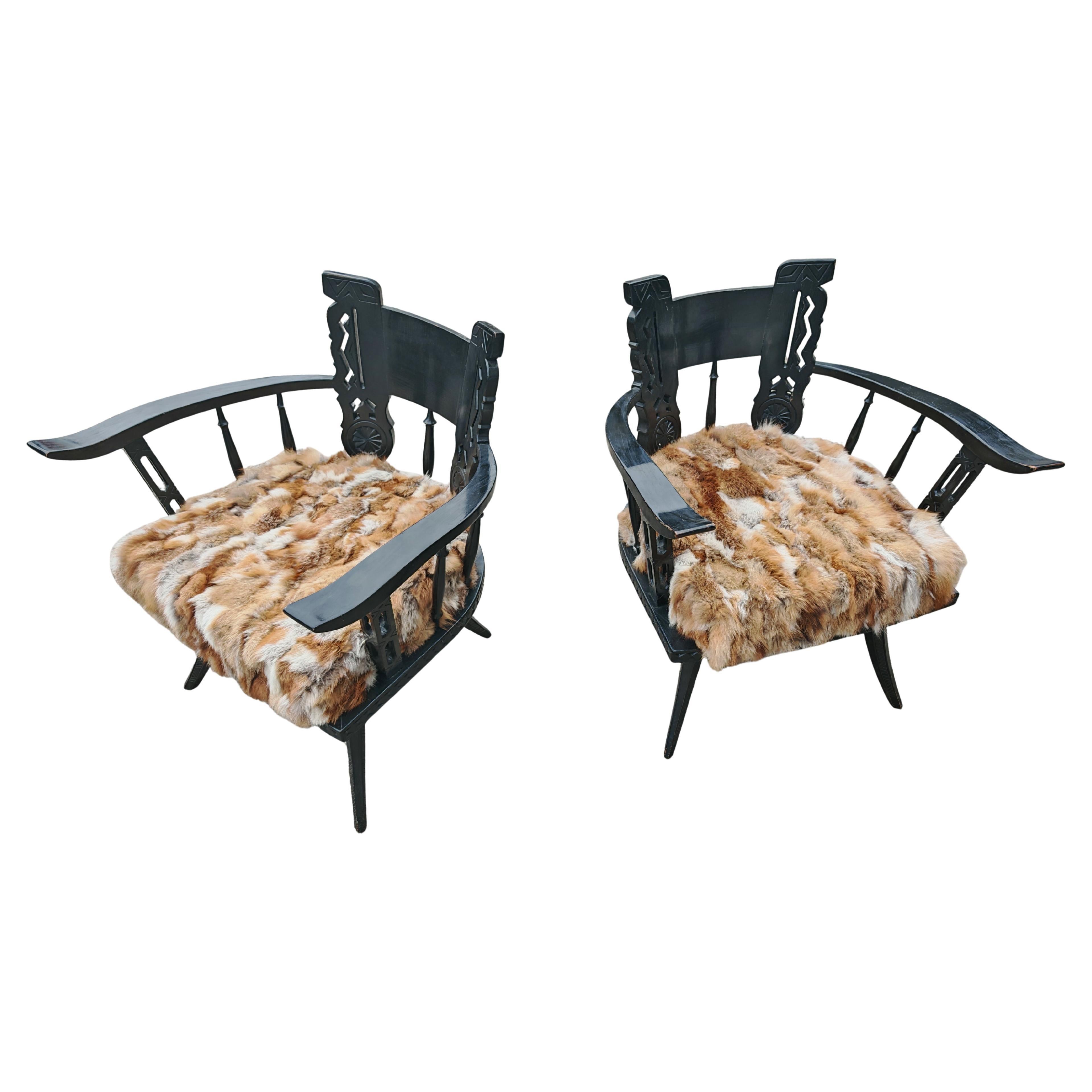 Pair of Antique hand-carved armchairs in black lacquer and fox fur, Italy 1920s For Sale