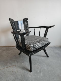 Pair of Antique hand-carved armchairs in black lacquer, Italy 1920s