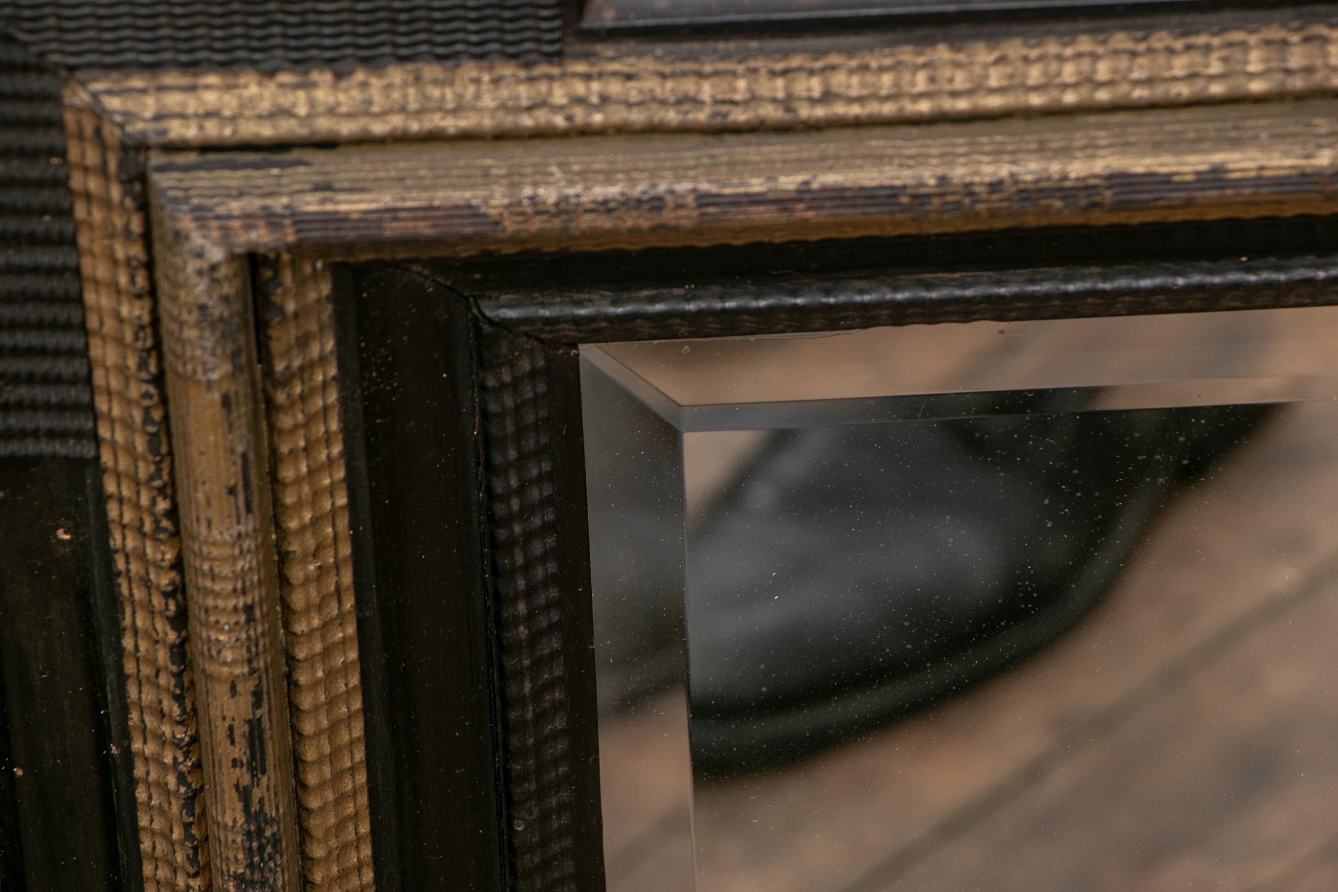 Rustic Pair of Antique Hand Carved, Ebonized and Gilt Frames Set with Mirrors