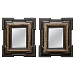 Pair of Antique Hand Carved, Ebonized and Gilt Frames Set with Mirrors