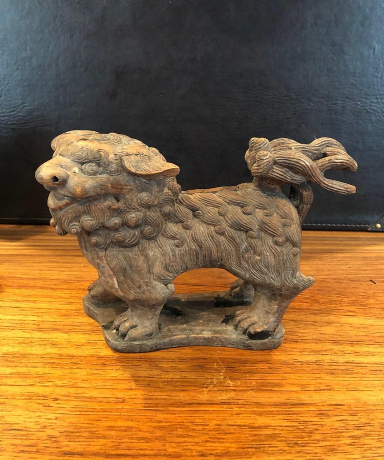 Pair of Antique Hand Carved Hard Wood Chinese Foo Dogs For Sale at 1stDibs