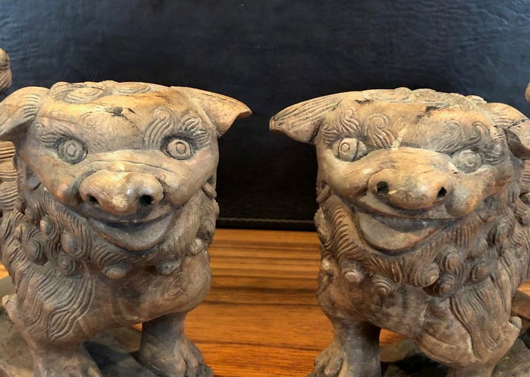 Pair of Antique Hand Carved Hard Wood Chinese Foo Dogs For Sale at 1stDibs