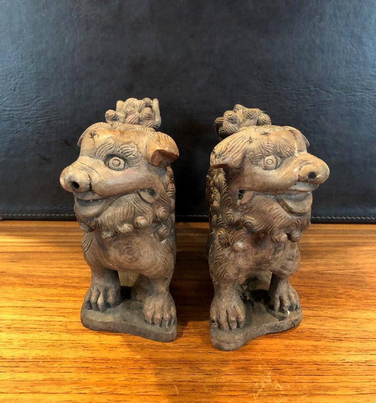Pair of Antique Hand Carved Hard Wood Chinese Foo Dogs For Sale at 1stDibs