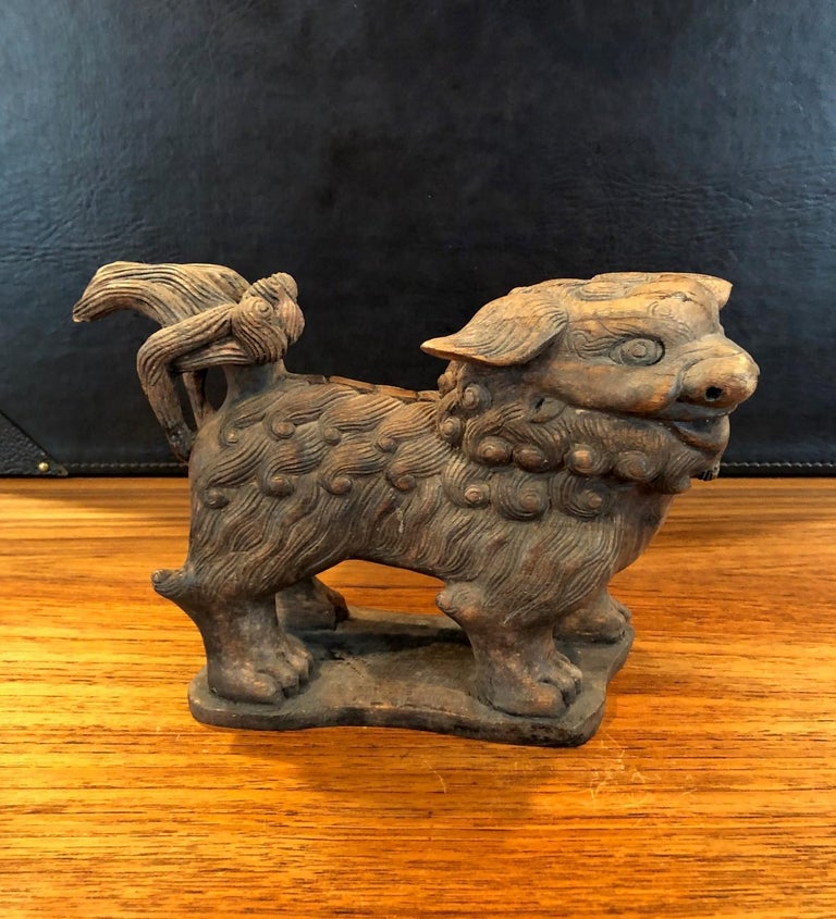 Pair of Antique Hand Carved Hard Wood Chinese Foo Dogs For Sale at 1stDibs
