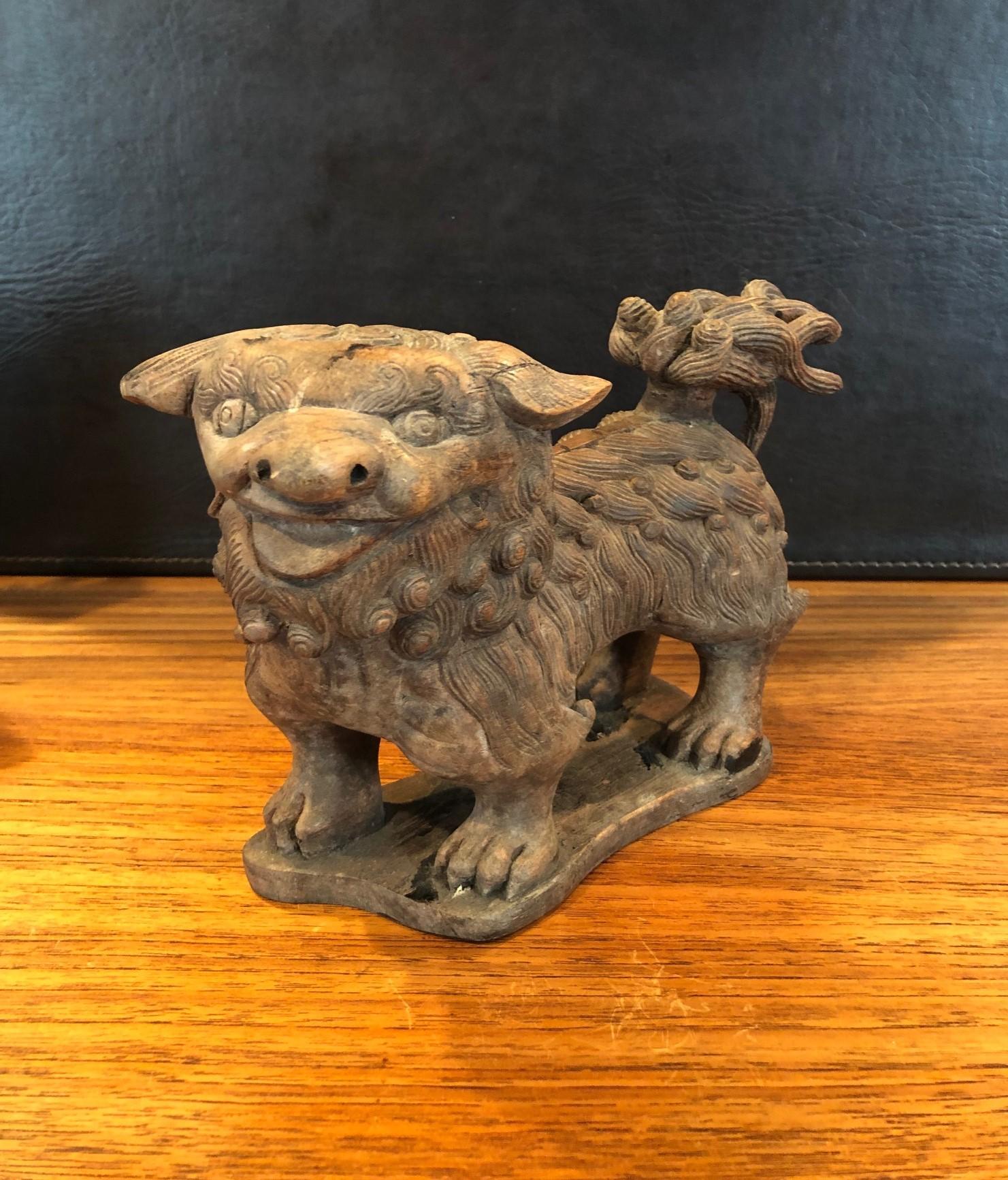 Pair of Antique Hand Carved Hard Wood Chinese Foo Dogs For Sale 3