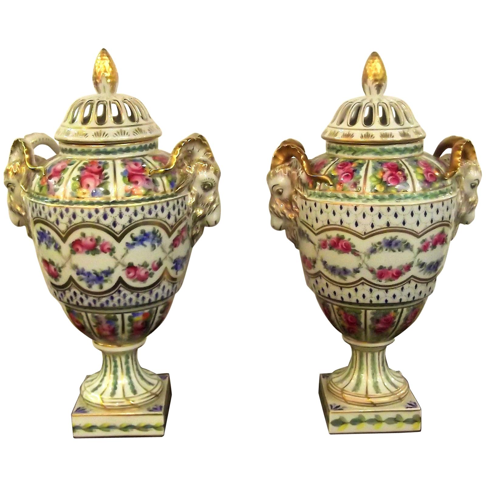 Pair of Antique Hand Painted Porcelain Dresden Urns with Lids