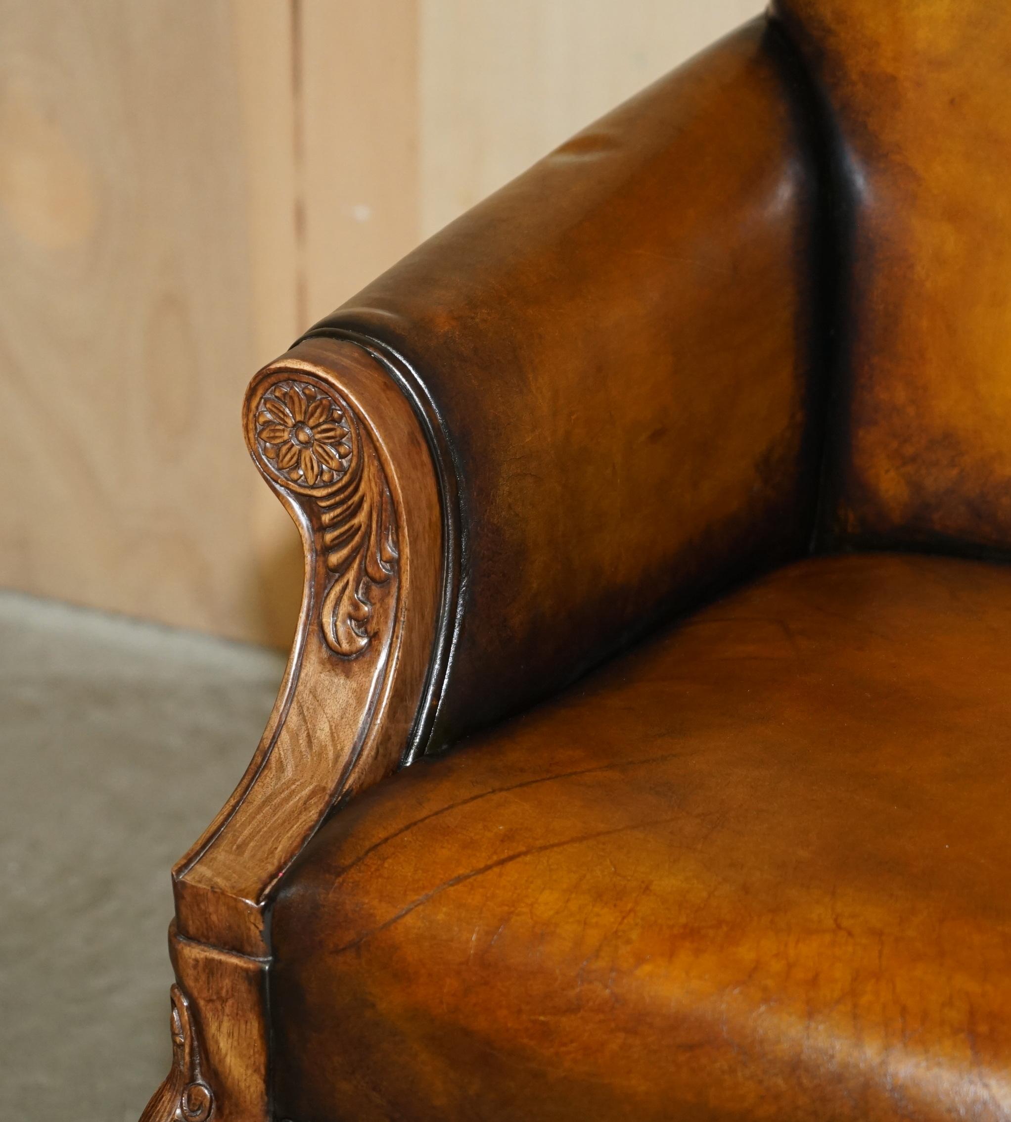 Hand-Crafted PAIR OF ANTIQUE HEAVILY CARVED HAND DYED BROWN LEATHER RESTORED THRONE ARMCHAIRs For Sale